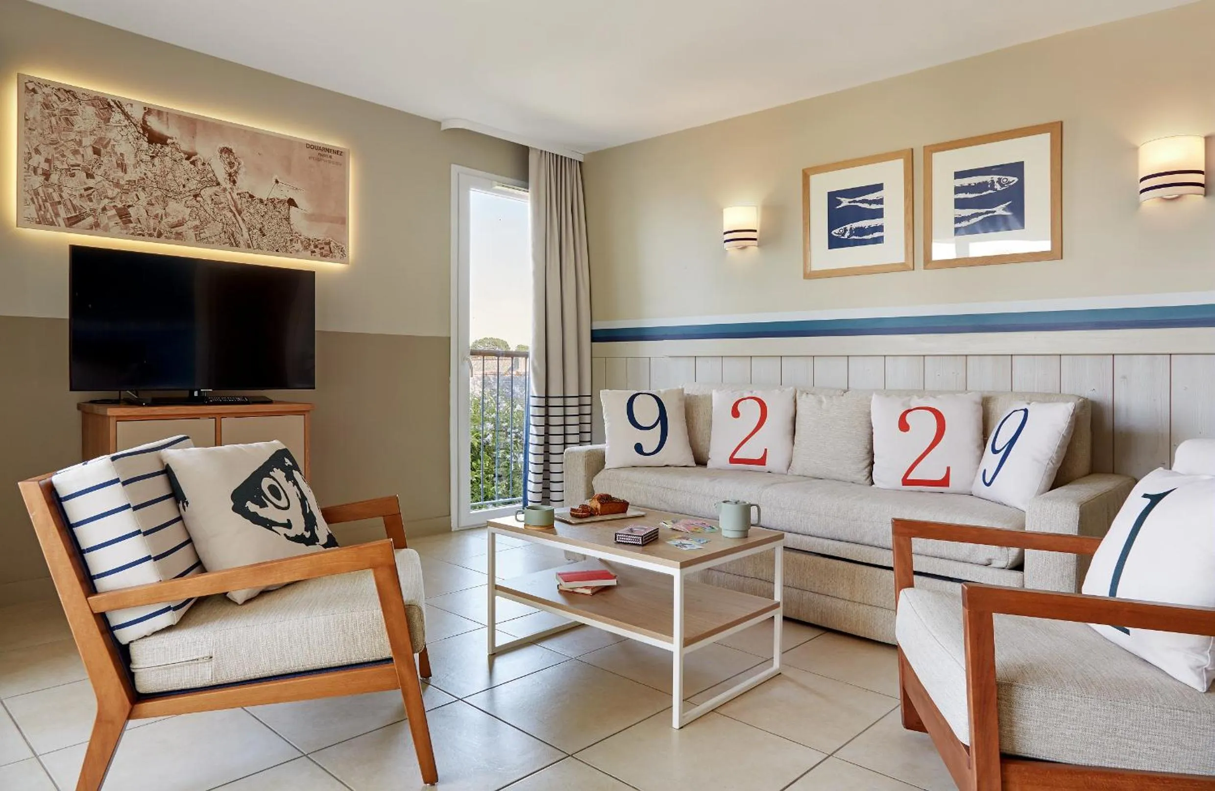 Communal lounge/ TV room in Résidence Pierre & Vacances Premium Le Coteau et la Mer