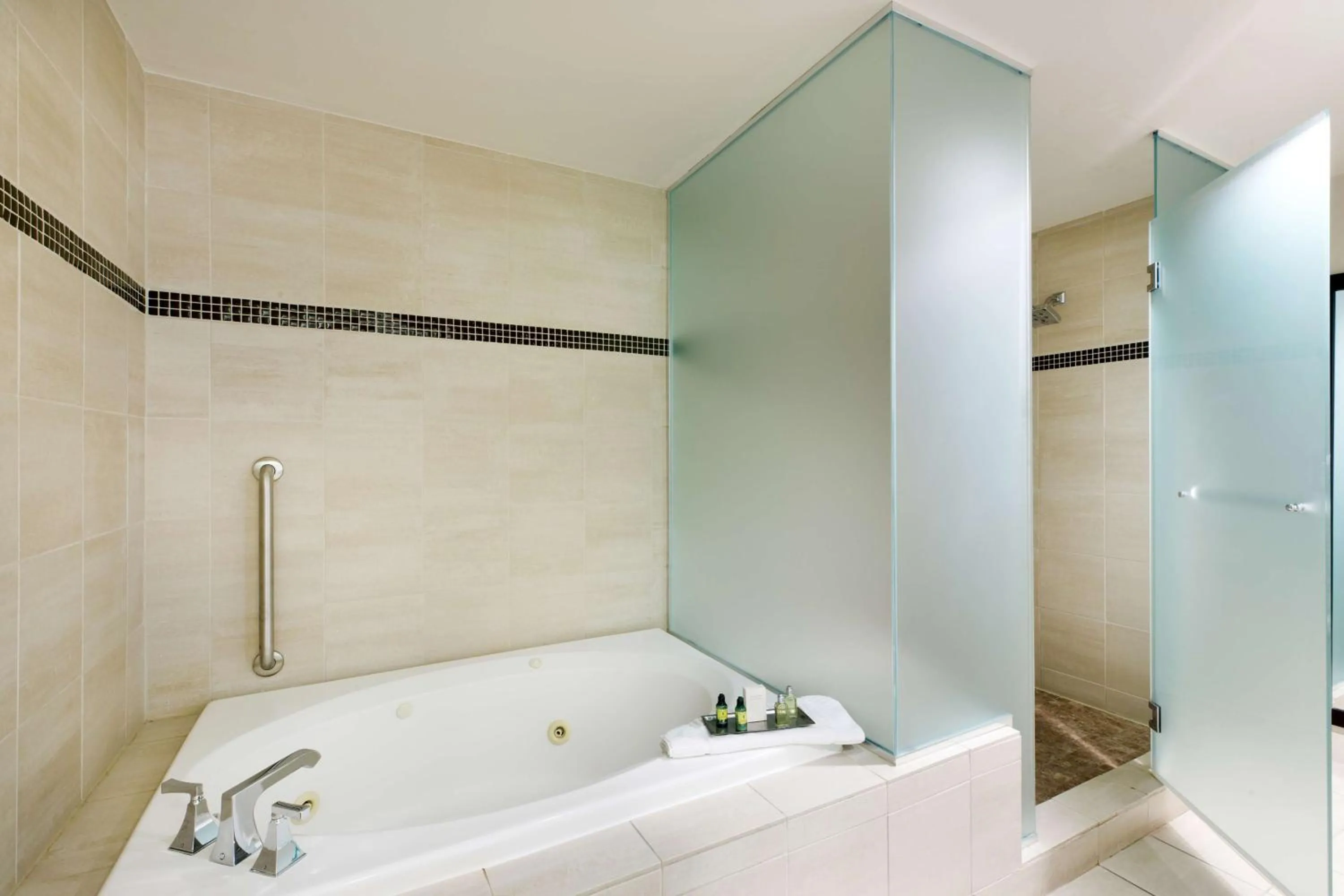 Bathroom in Colcord Hotel Oklahoma City, Curio Collection by Hilton