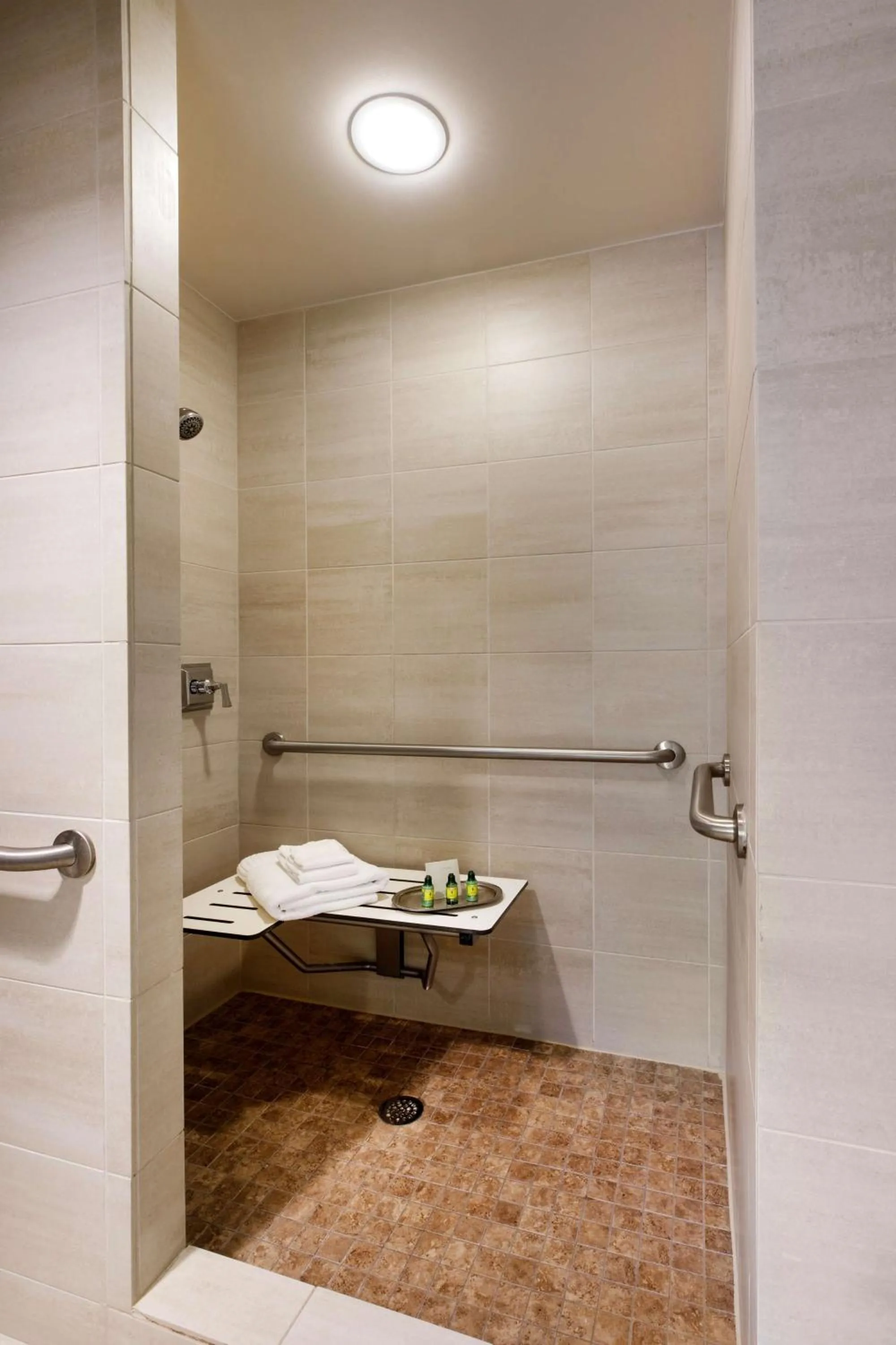 Bathroom in Colcord Hotel Oklahoma City, Curio Collection by Hilton