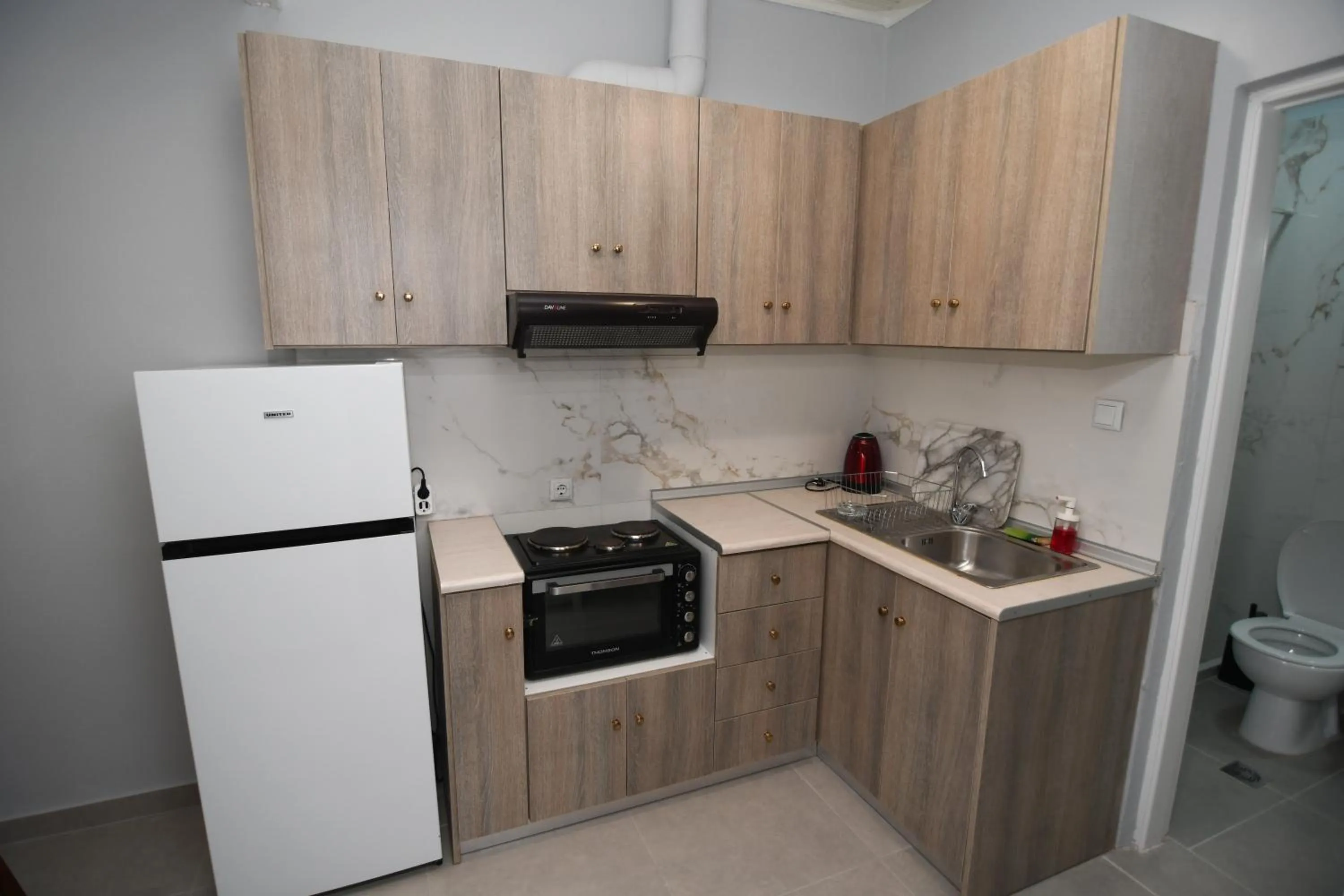 Kitchen or kitchenette in Rose Garden Apartments