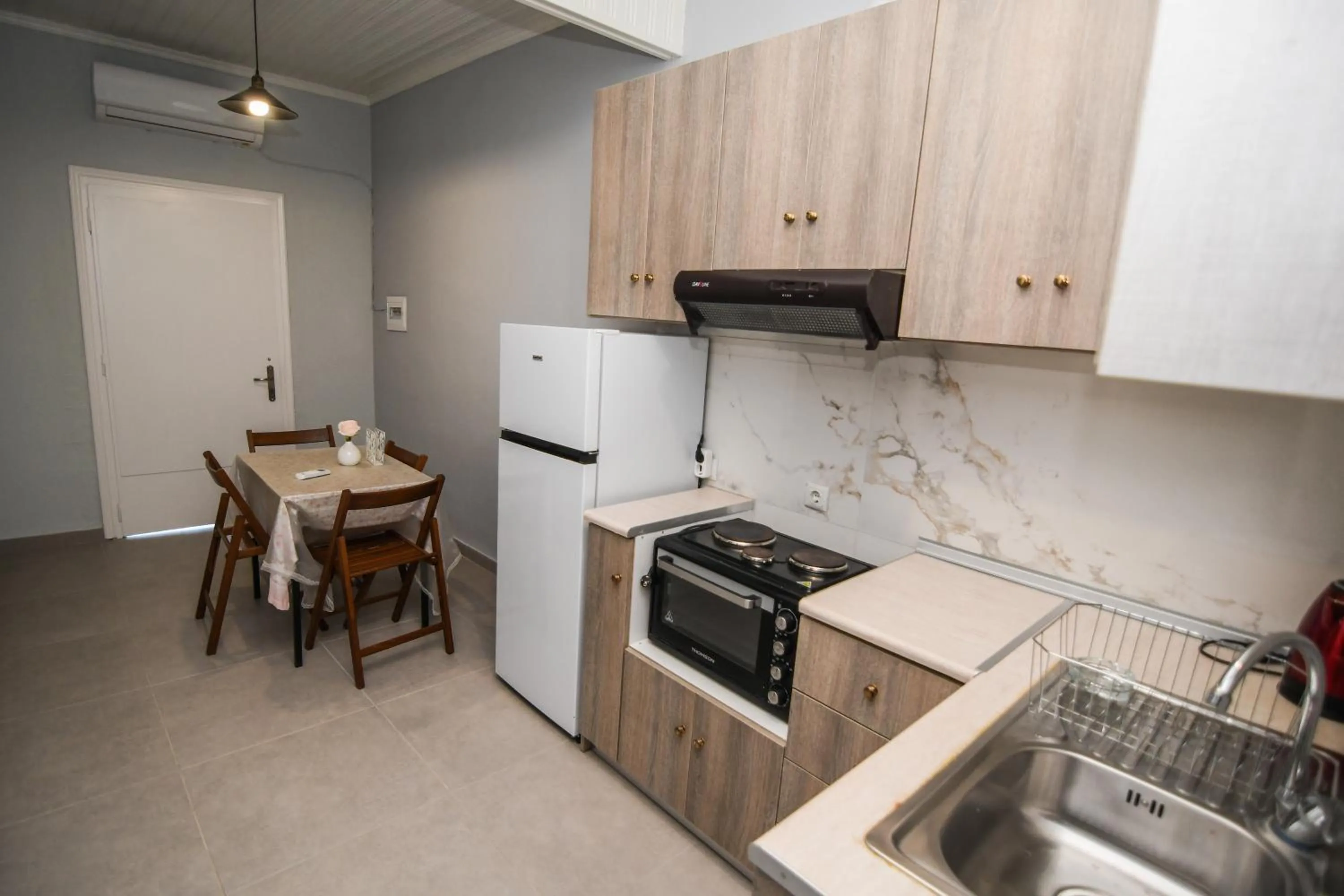 Kitchen or kitchenette in Rose Garden Apartments