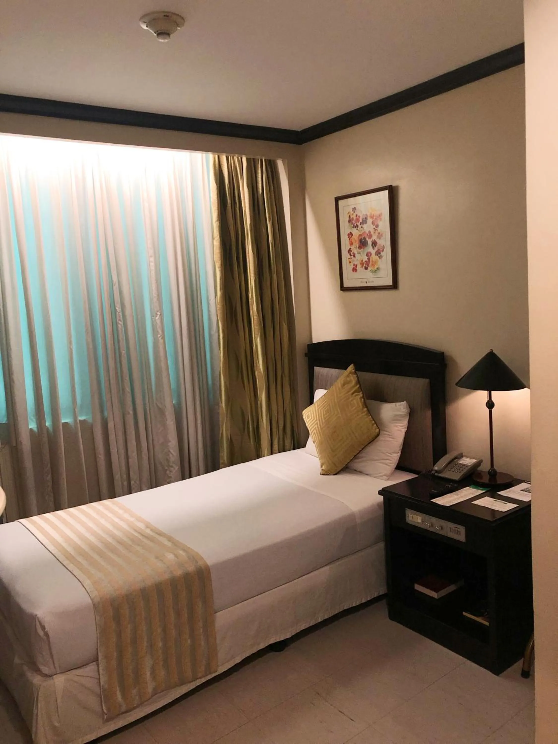 Bed in Tower Inn Makati Business Hotel