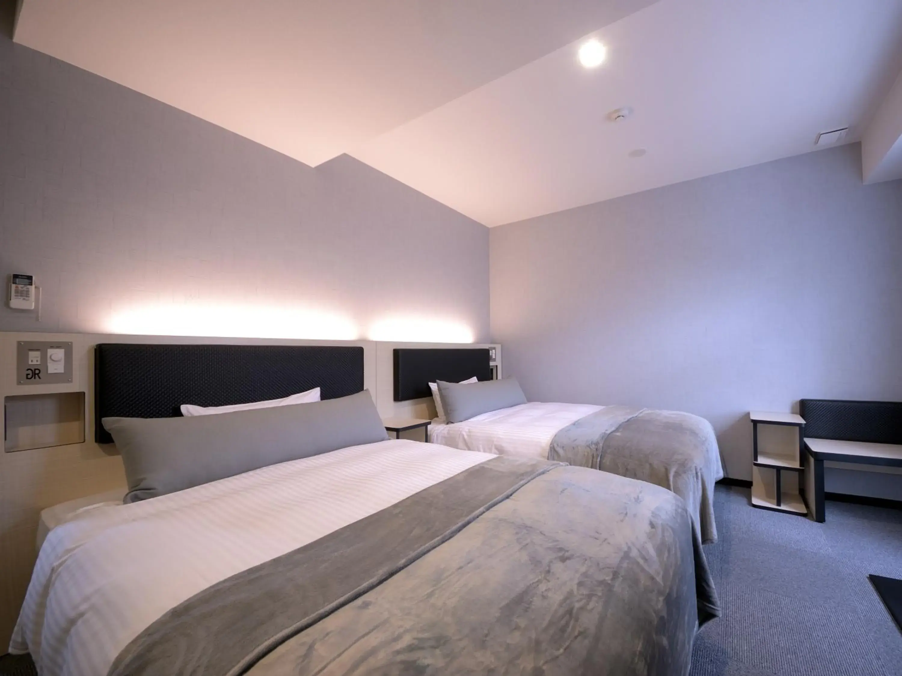 Bed in Green Rich Hotel Tottori Ekimae (Artificial hot spring Futamata Yunohana) Bed in Green Rich Hotel Tottori Ekimae (Artificial hot spring Futamata Yunohana)