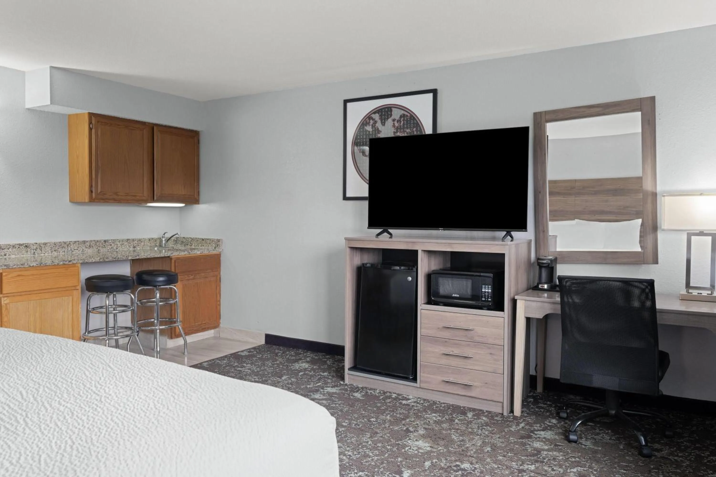 Photo of the whole room, Bed in Ramada by Wyndham Cedar Rapids South