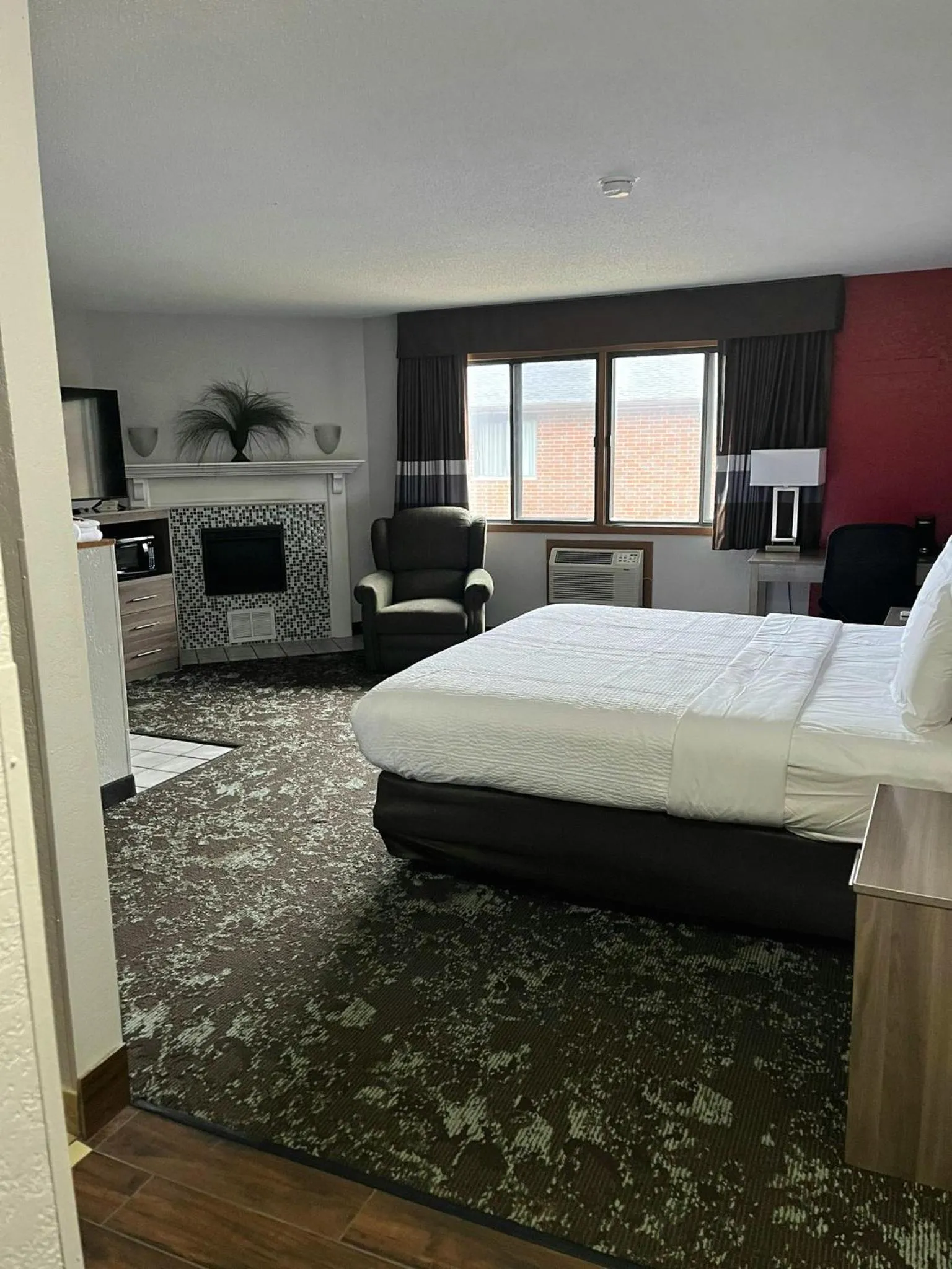 Bed in Ramada by Wyndham Cedar Rapids South