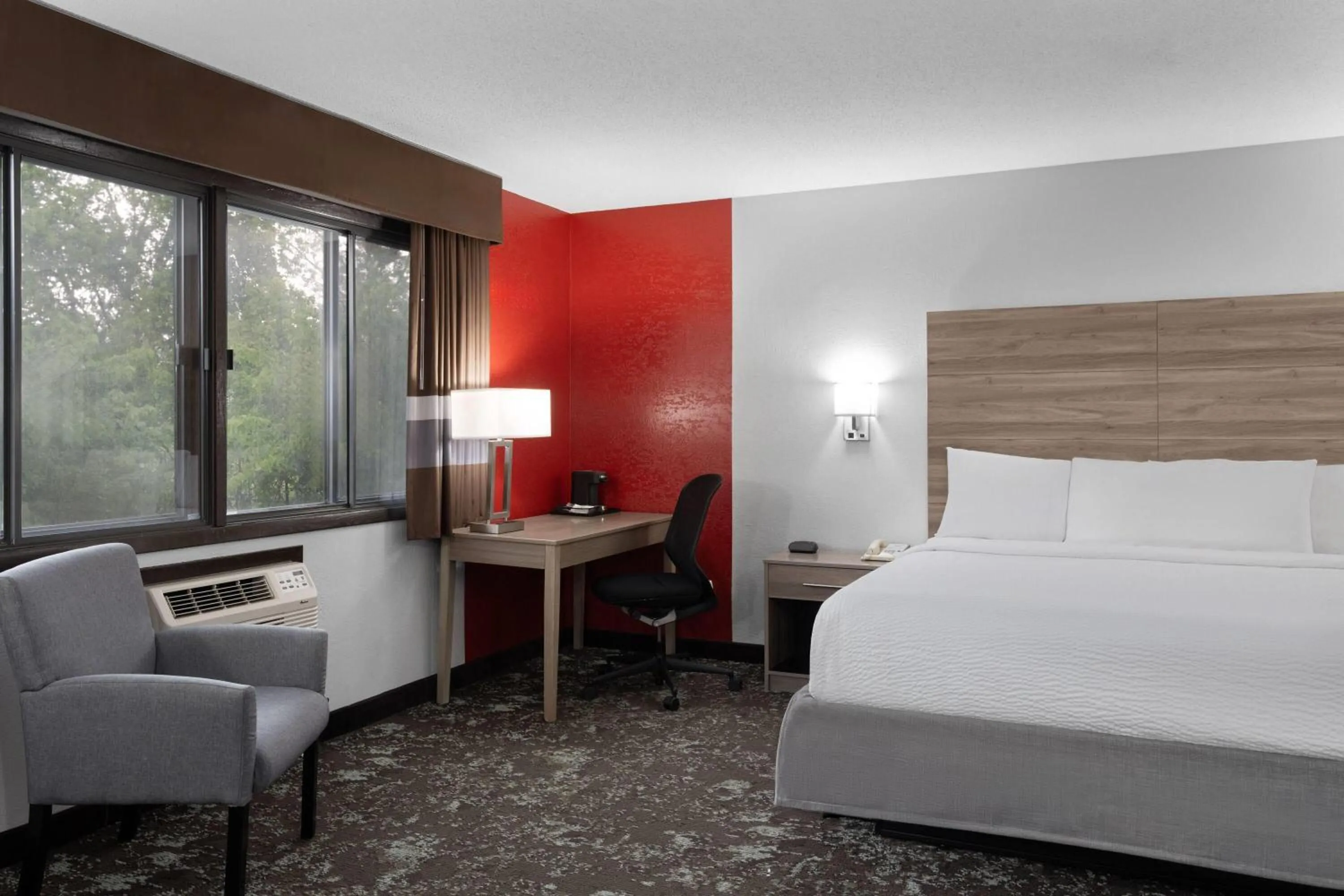 Photo of the whole room, Bed in Ramada by Wyndham Cedar Rapids South