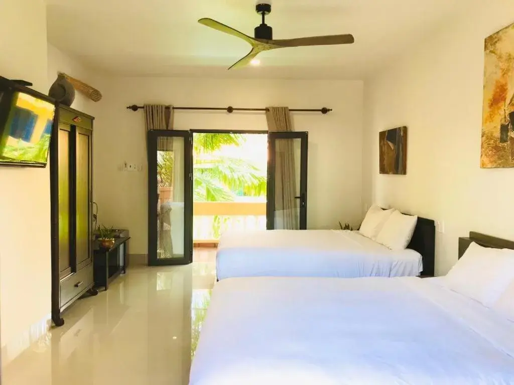 Bed in MiNhon Hotel Muine Bed in MiNhon Hotel Muine