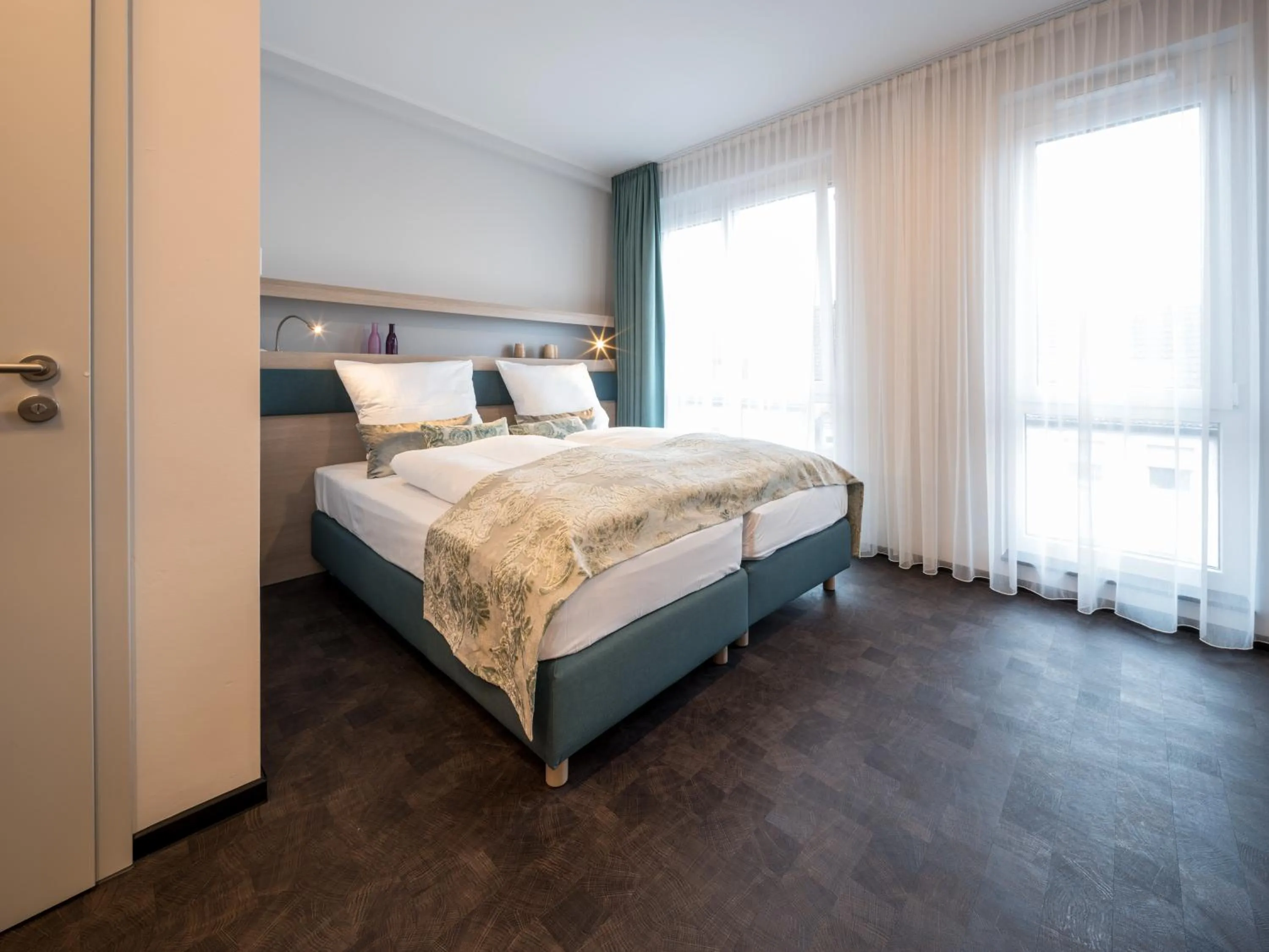 Bed in RS-HOTEL - smart & modern Hotel Apartments