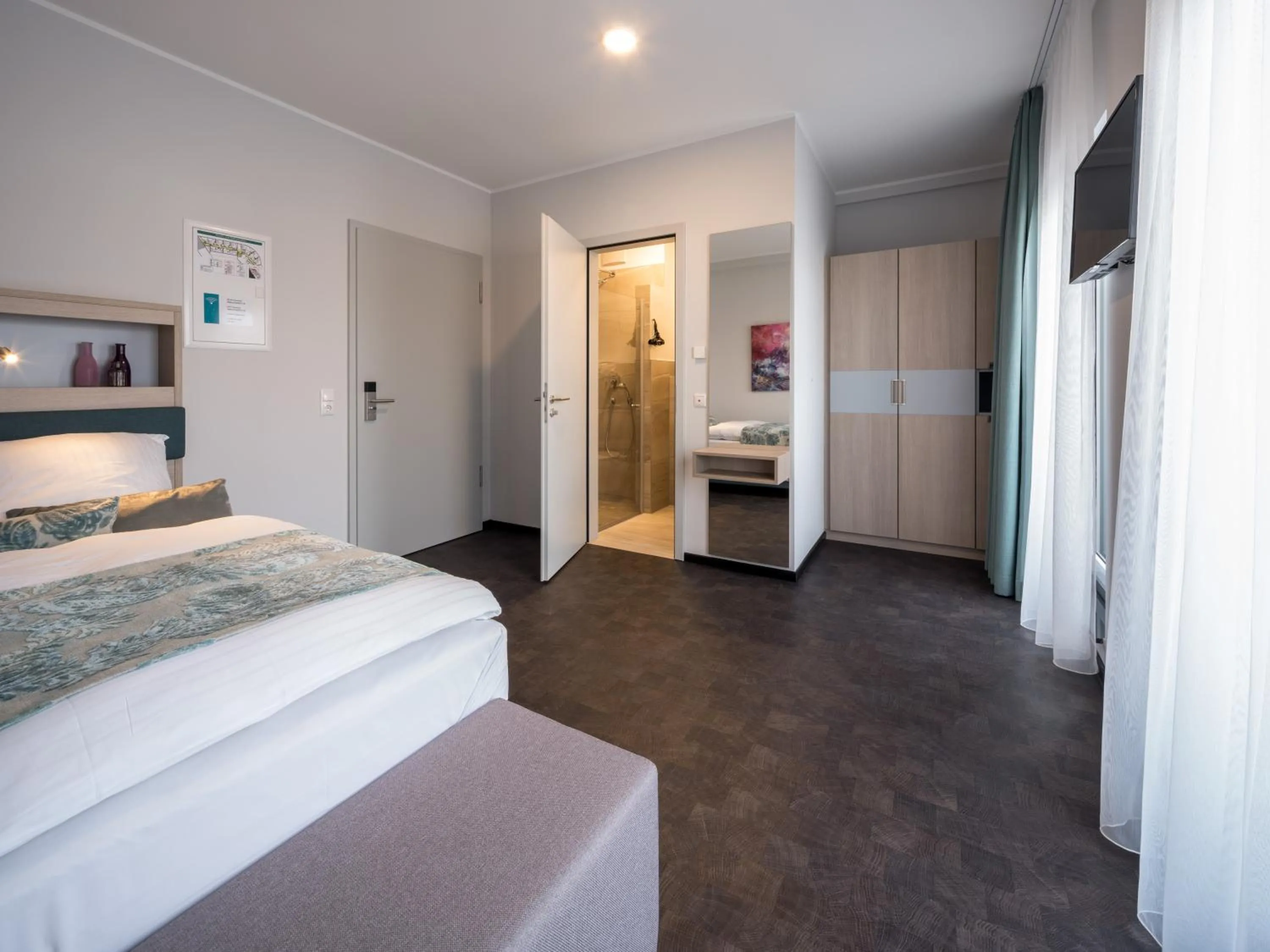 Bed in RS-HOTEL - smart & modern Hotel Apartments