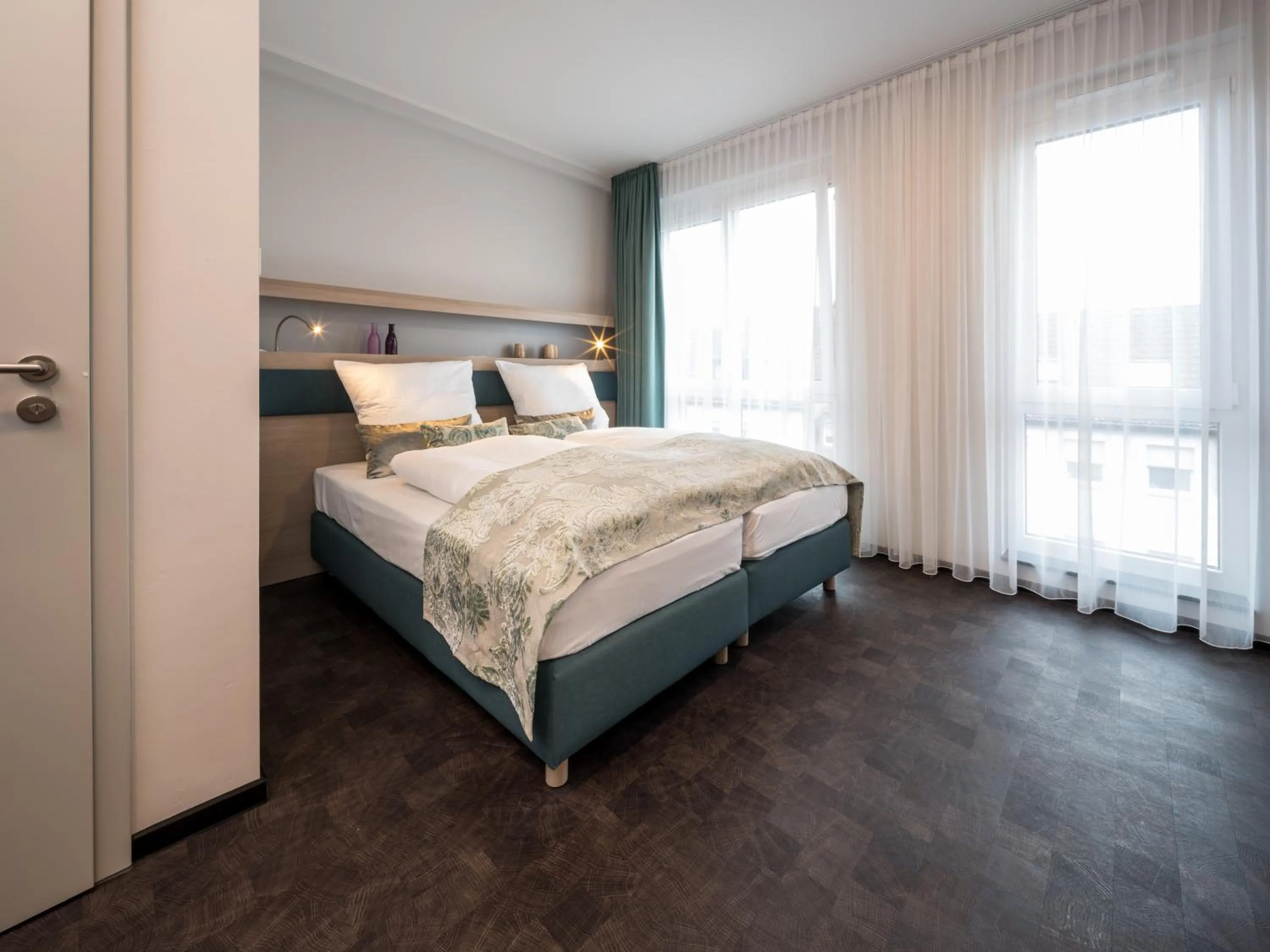 Bed in RS-HOTEL - smart & modern Hotel Apartments