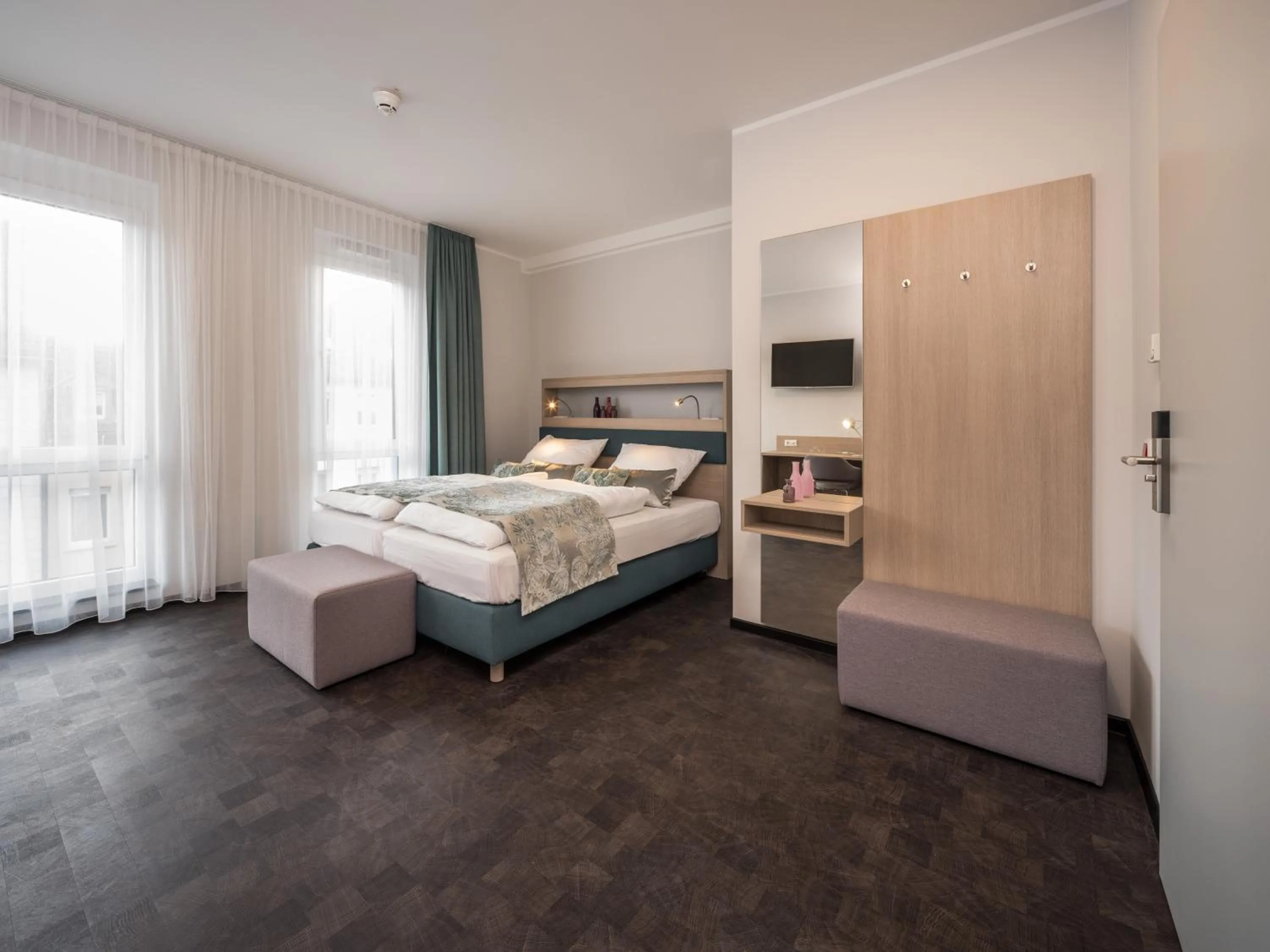 Bed in RS-HOTEL - smart & modern Hotel Apartments