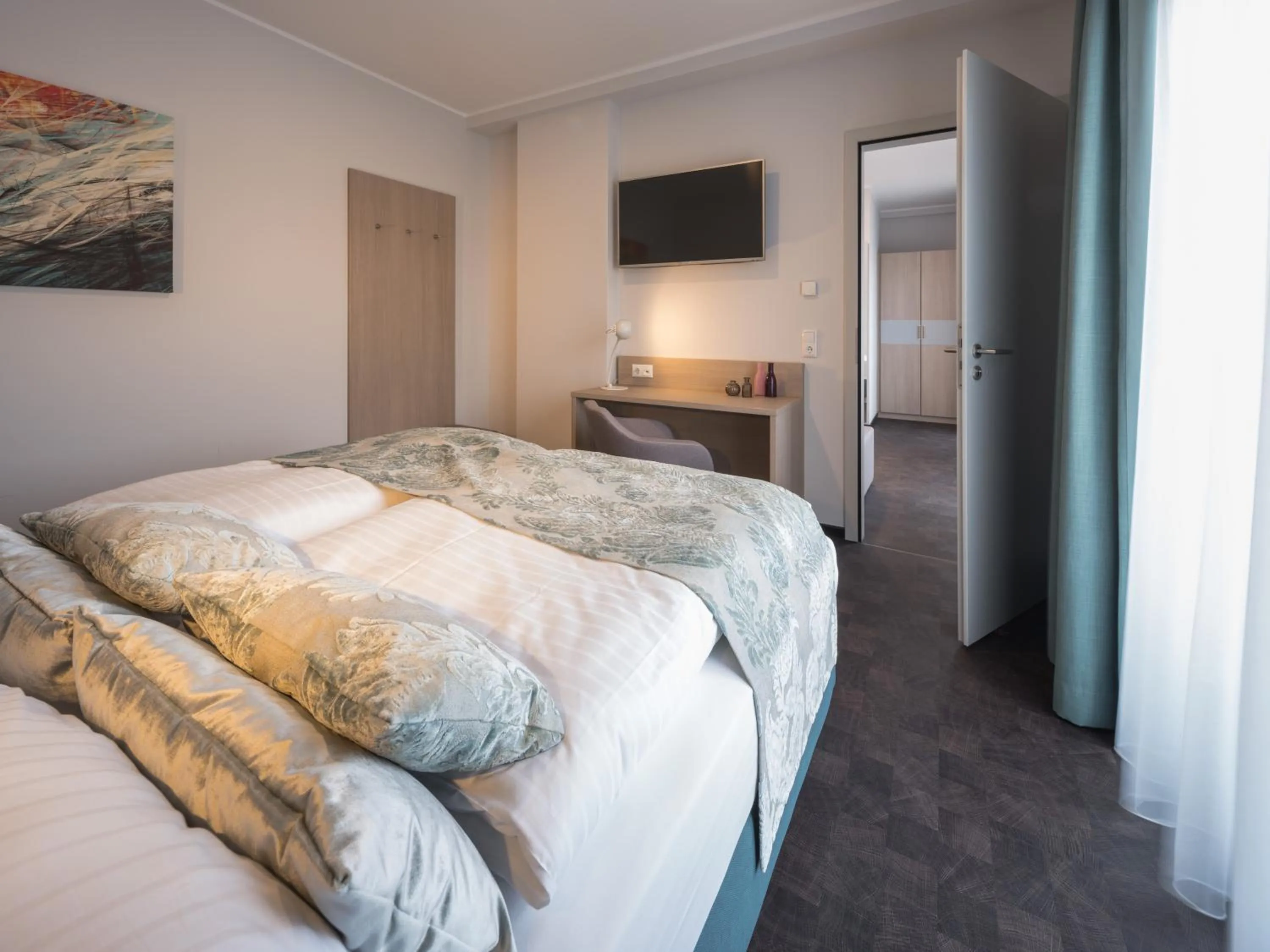 Bed in RS-HOTEL - smart & modern Hotel Apartments