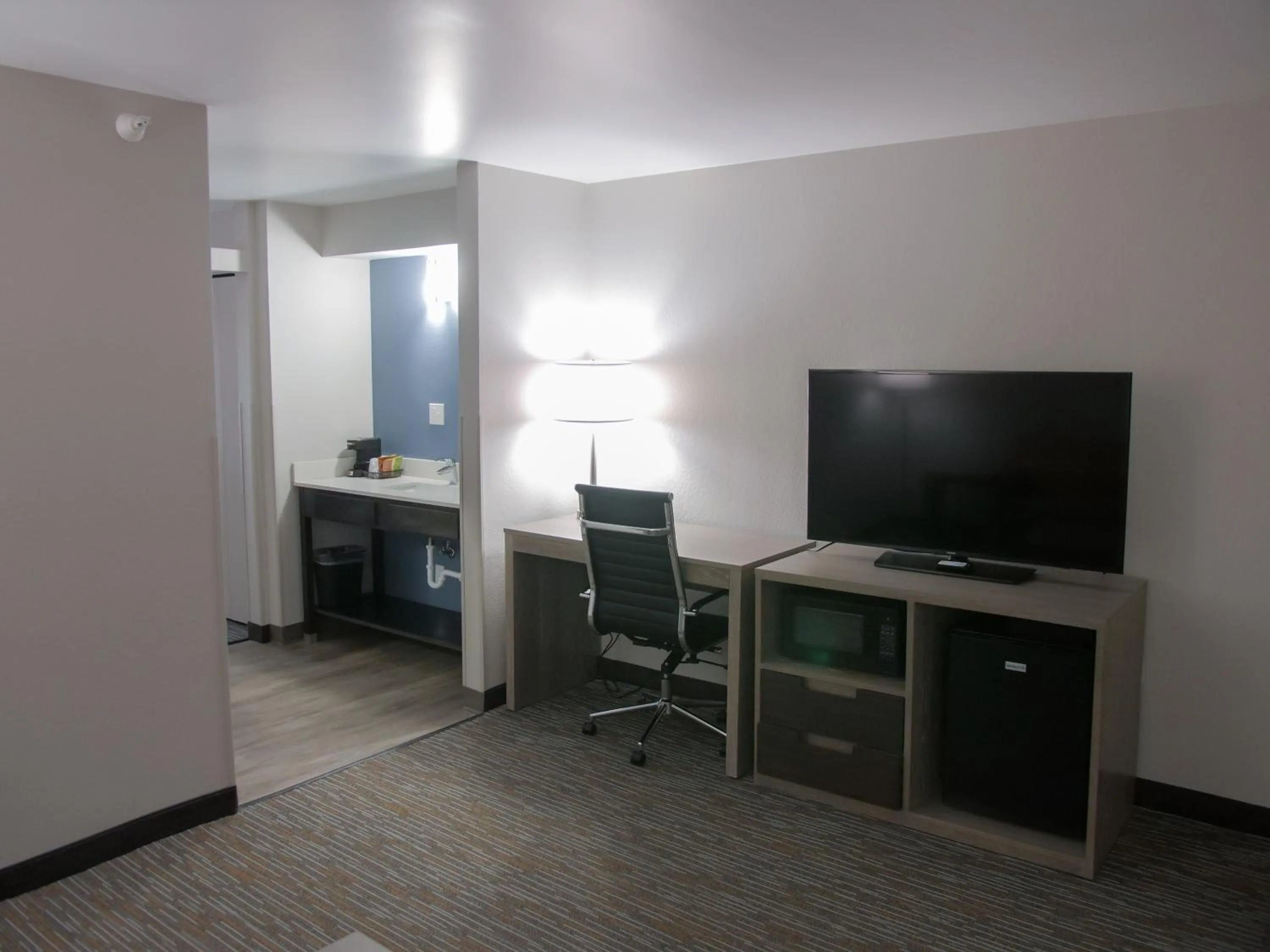 Living room in Wingate by Wyndham Louisville Airport Expo Center