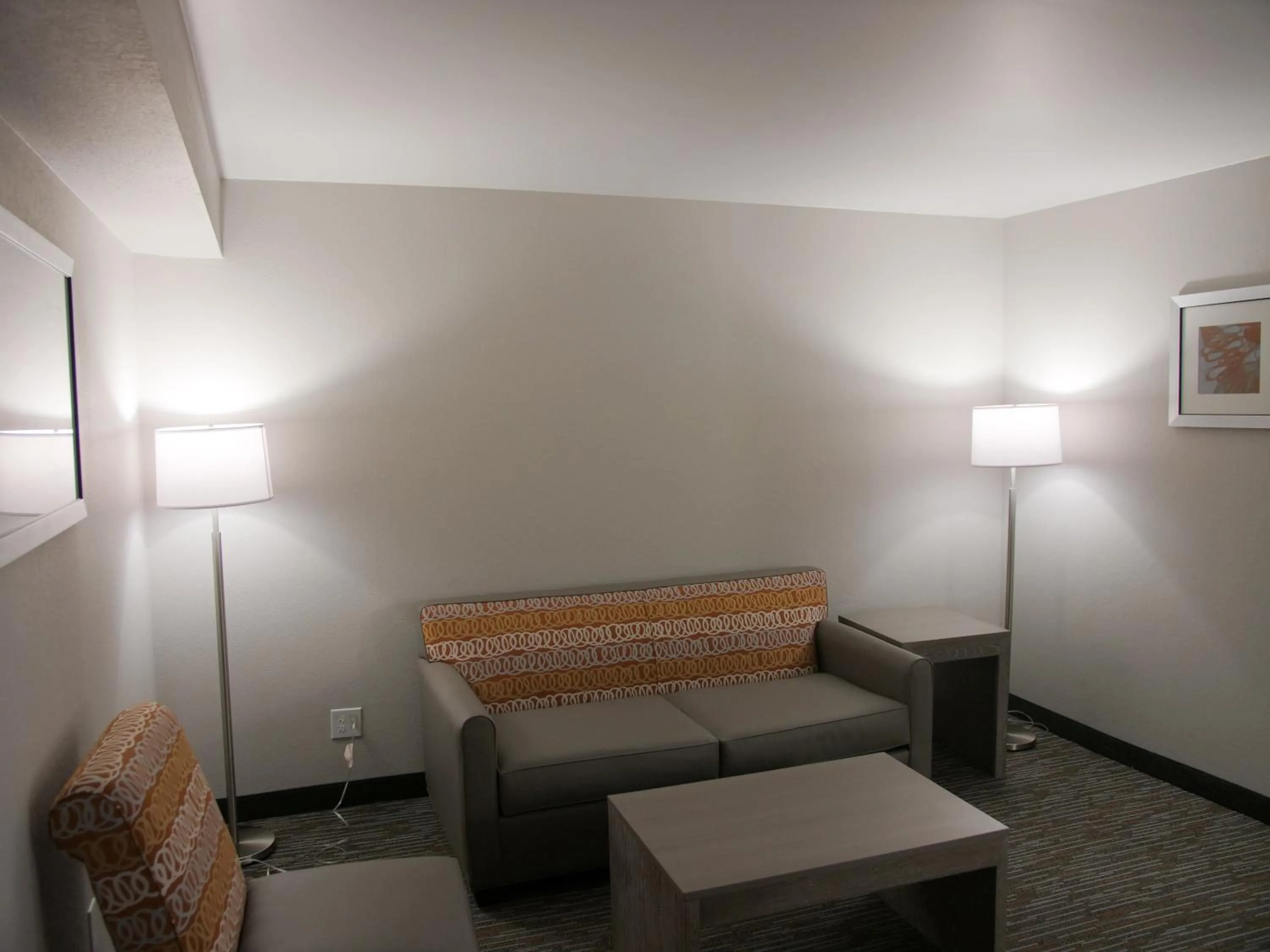 Living room in Wingate by Wyndham Louisville Airport Expo Center