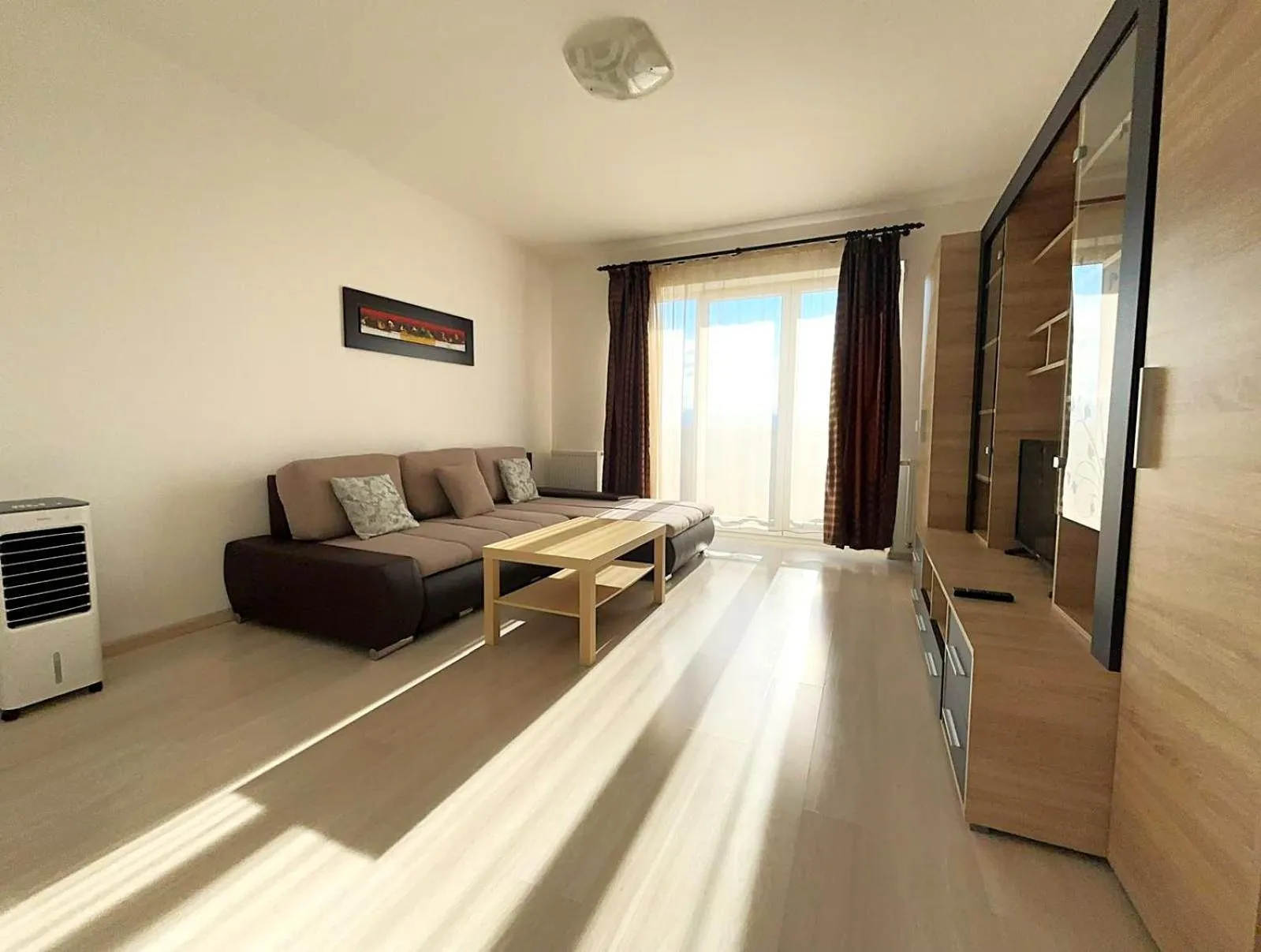 Communal lounge/ TV room in Brasov Altipiani Apartments