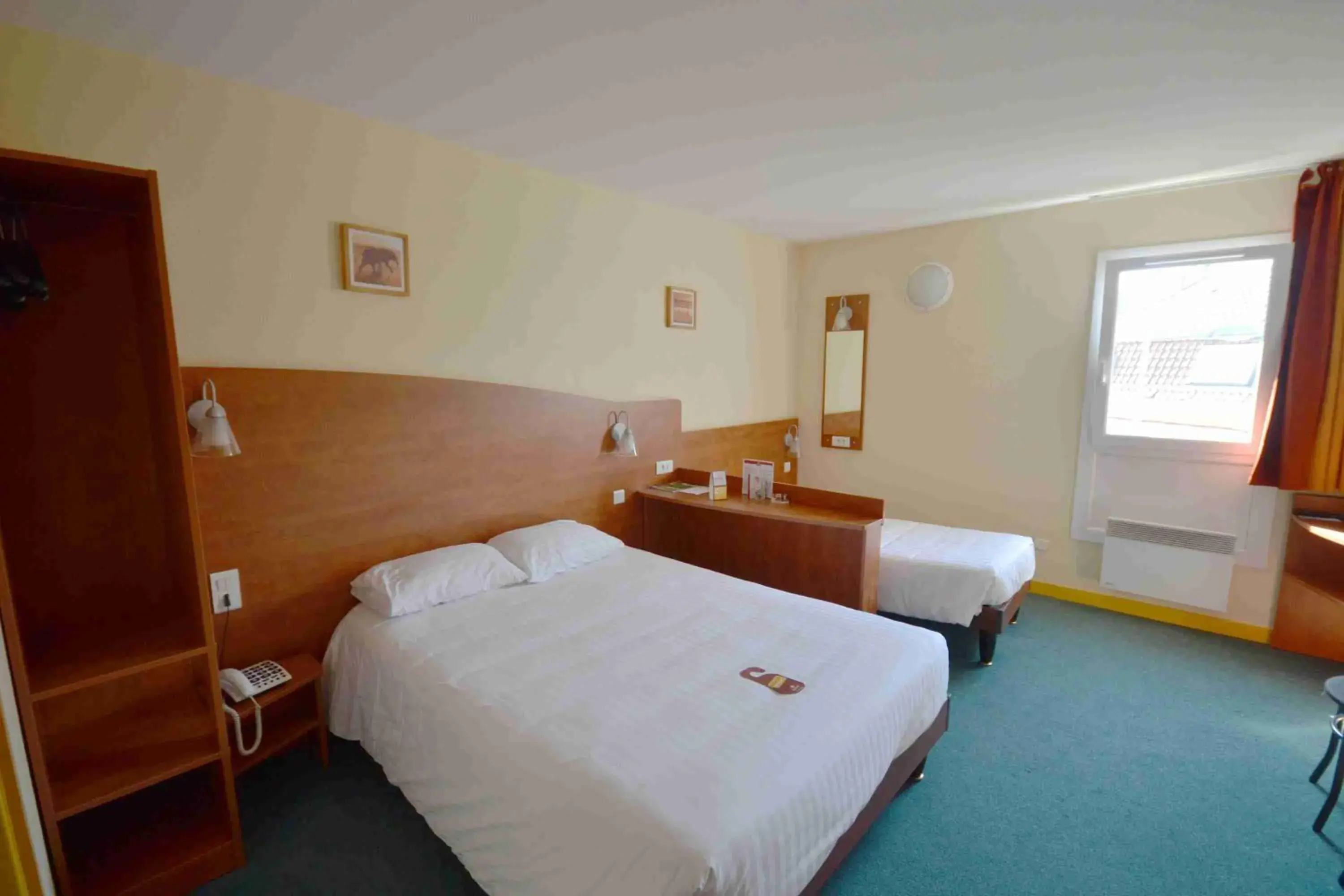 Triple Room (1 double bed and 1 simple bed) in Adams Hotel Triple Room (1 double bed and 1 simple bed) in Adams Hotel