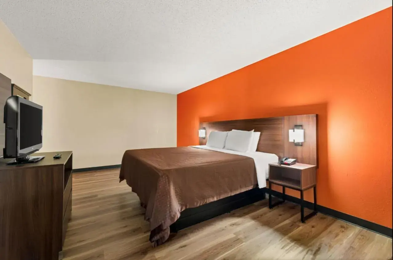 Bed in Suburban Studios Winston-Salem near Hanes Mall Bed in Suburban Studios Winston-Salem near Hanes Mall