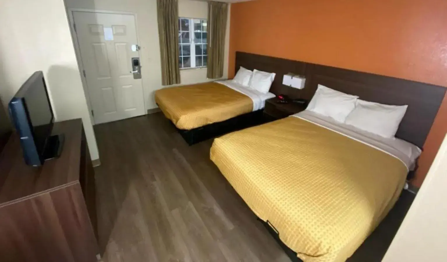 Photo of the whole room, Bed in Suburban Studios Winston-Salem near Hanes Mall Photo of the whole room, Bed in Suburban Studios Winston-Salem near Hanes Mall