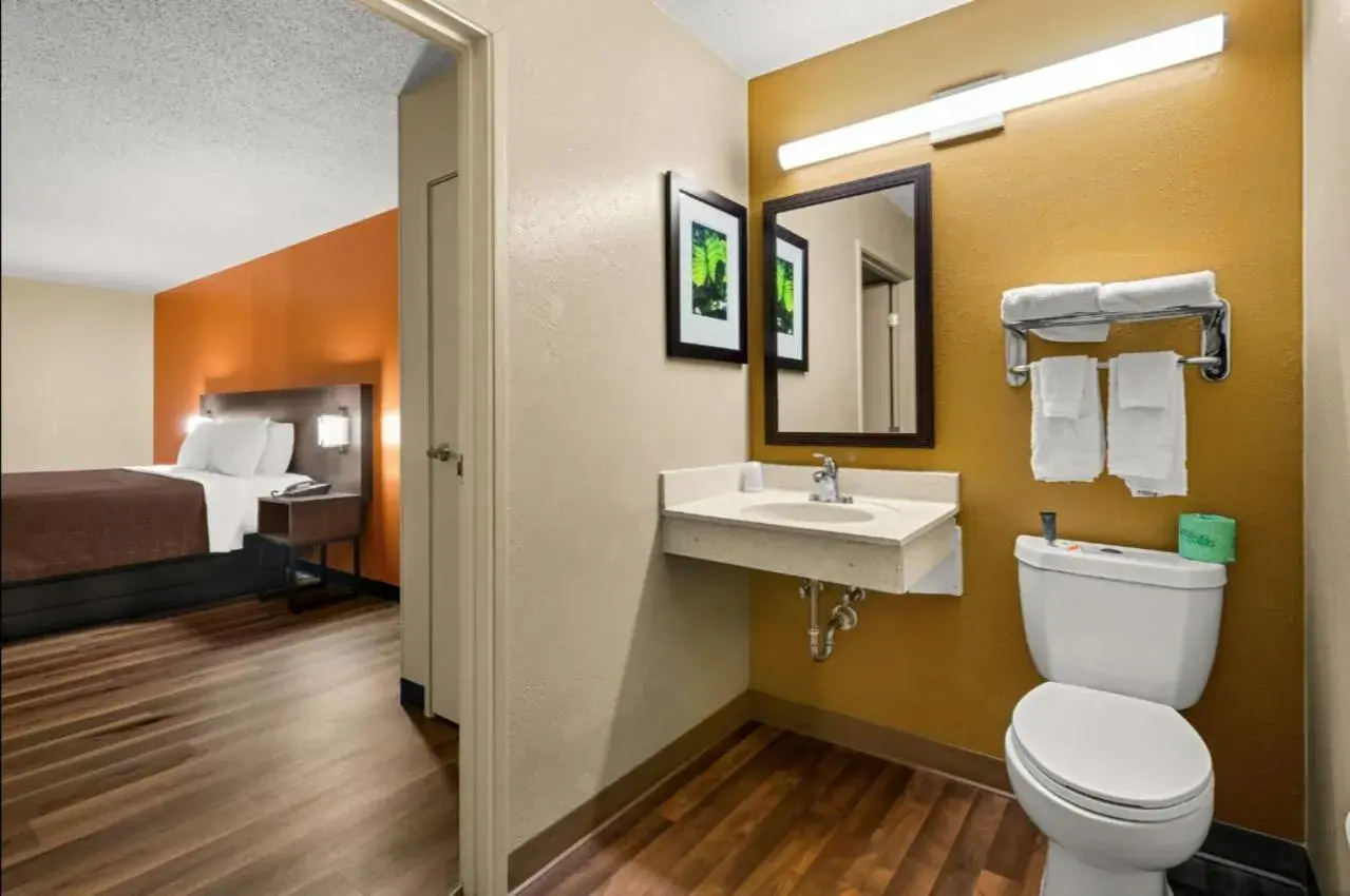 Bed in Suburban Studios Winston-Salem near Hanes Mall Bed in Suburban Studios Winston-Salem near Hanes Mall