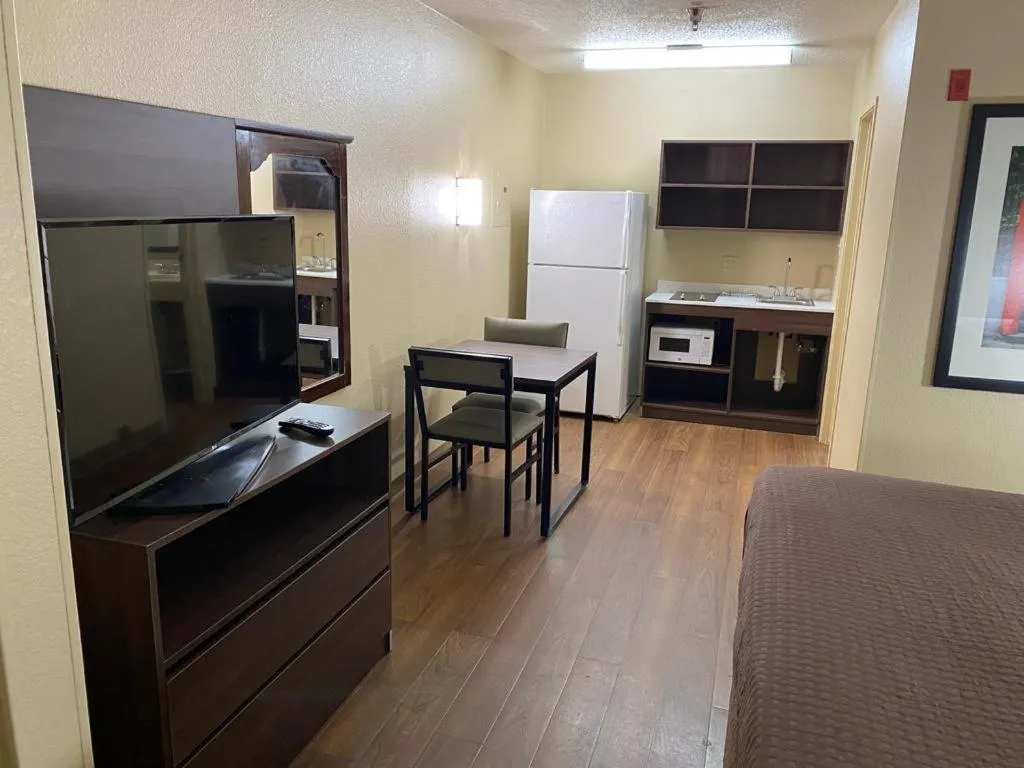 Kitchen or kitchenette in Suburban Studios Winston-Salem near Hanes Mall