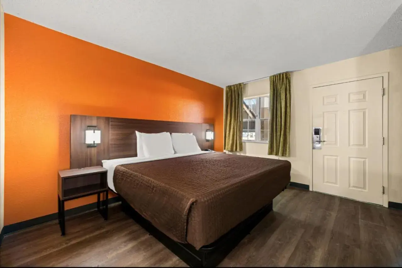 Bed in Suburban Studios Winston-Salem near Hanes Mall Bed in Suburban Studios Winston-Salem near Hanes Mall