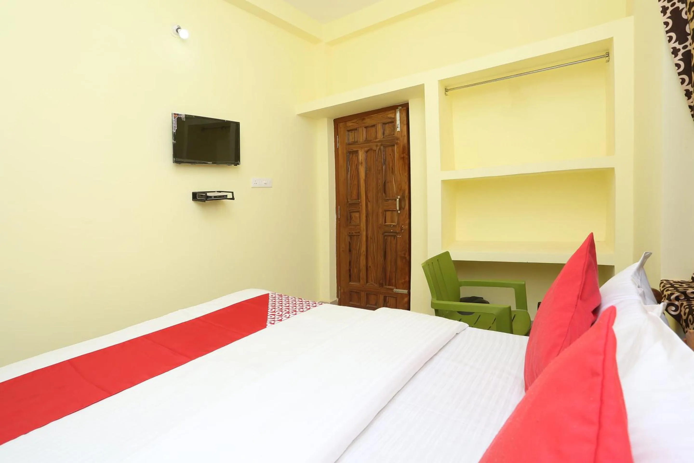 Bedroom in Hotel O Nandan Residency