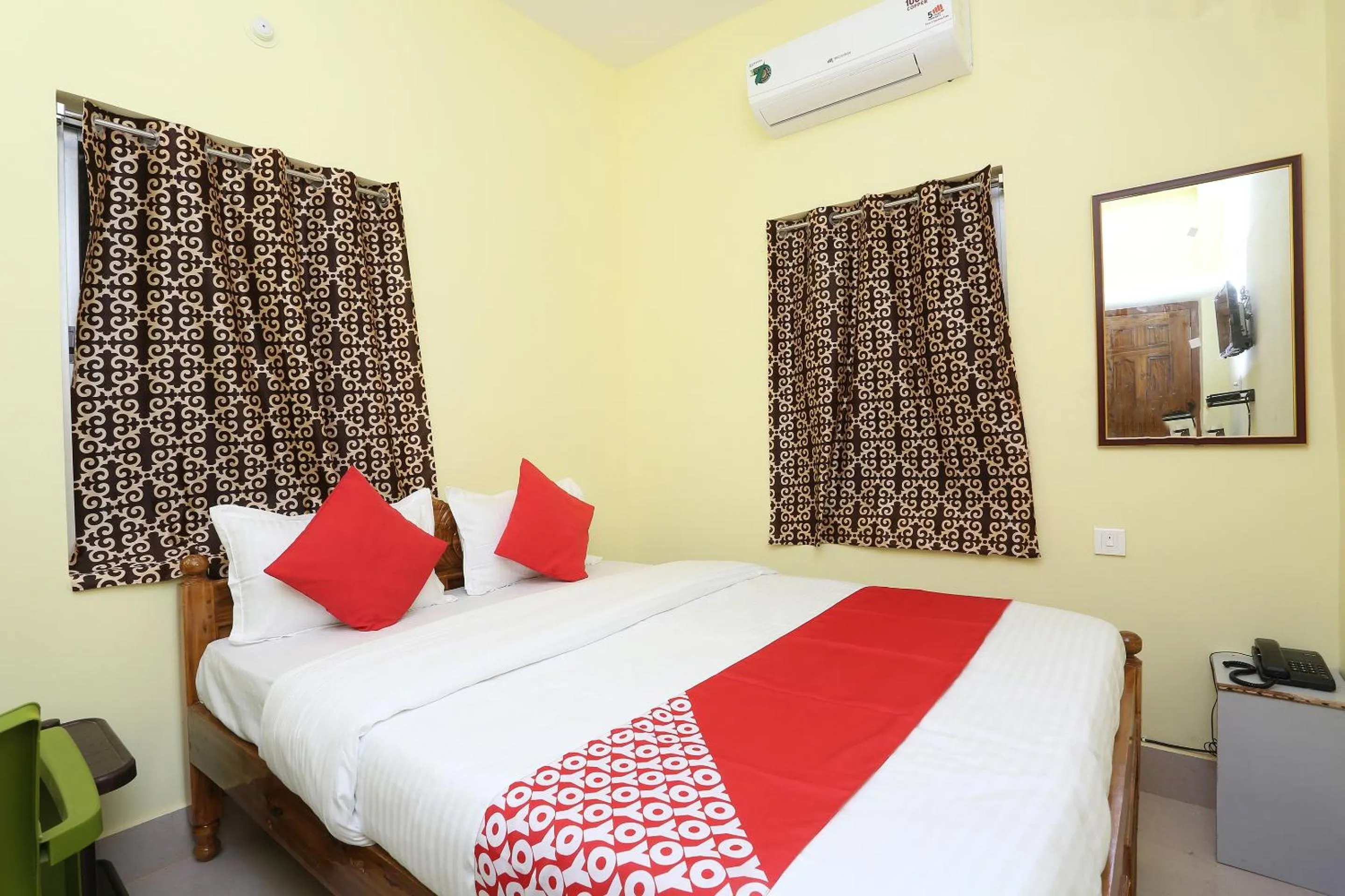 Bedroom in Hotel O Nandan Residency