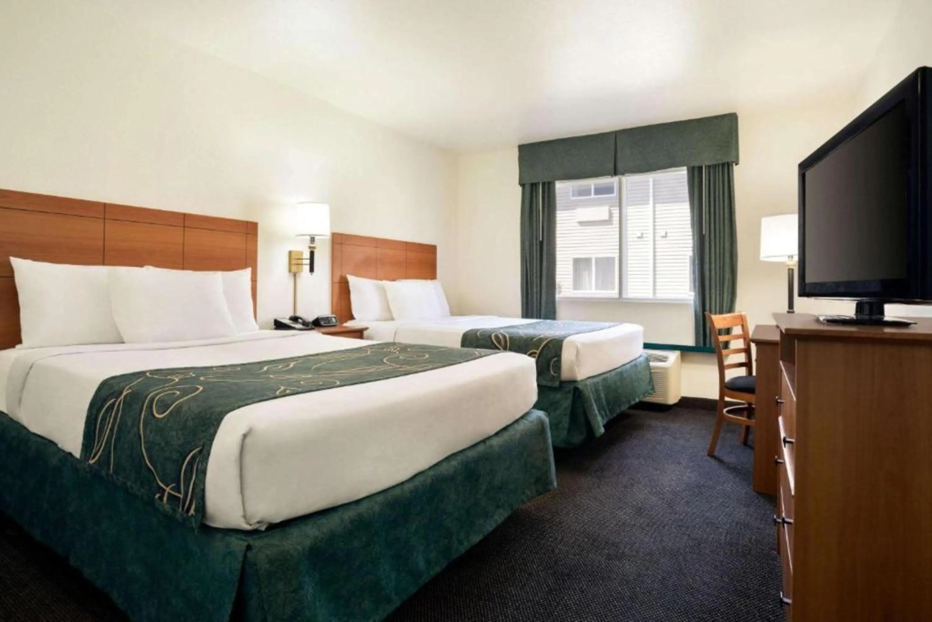 Bed in Travelodge by Wyndham Bill WY Thunder Basin Ntl Grassland