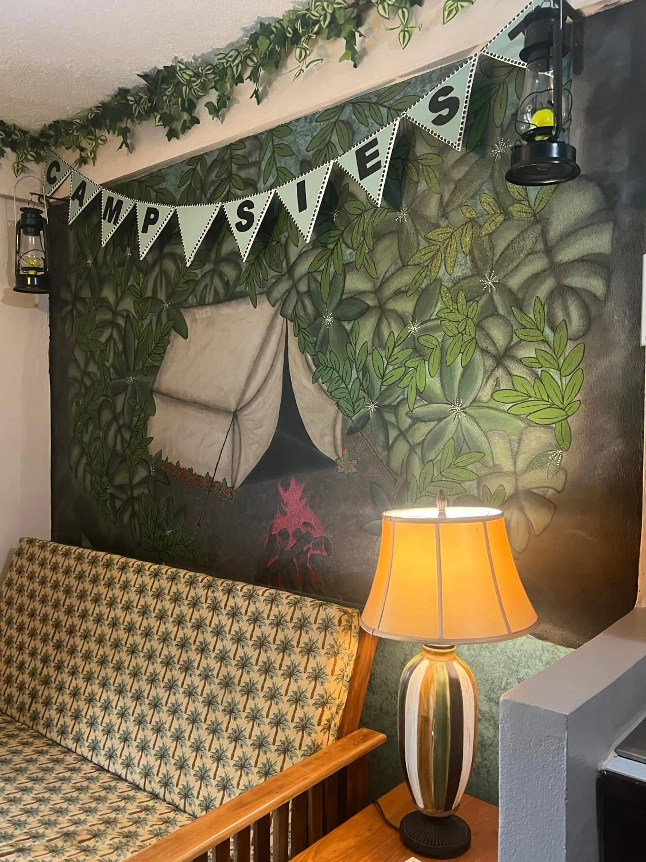 Living room, Bed in Belize Budget Suites