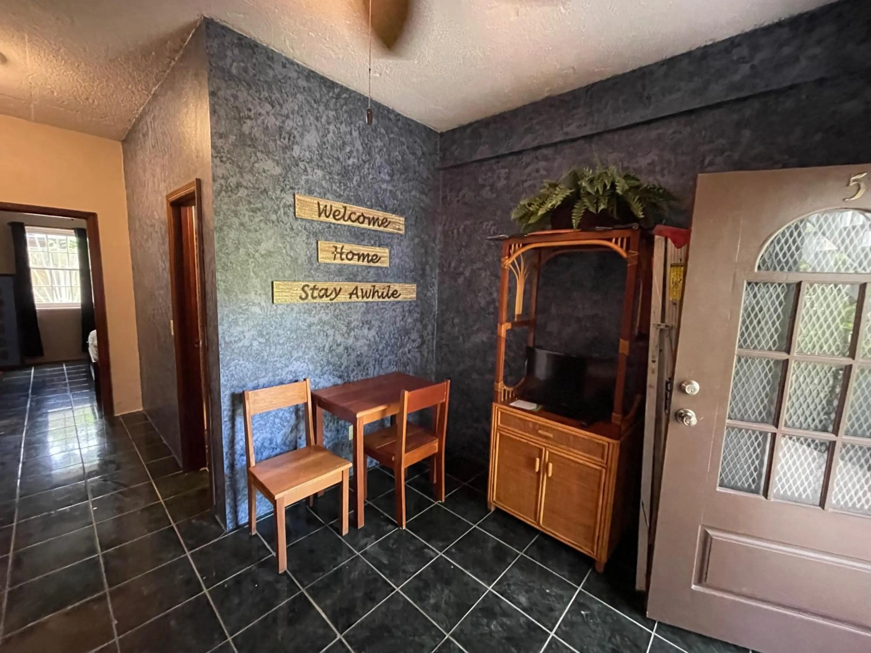 Living room in Belize Budget Suites