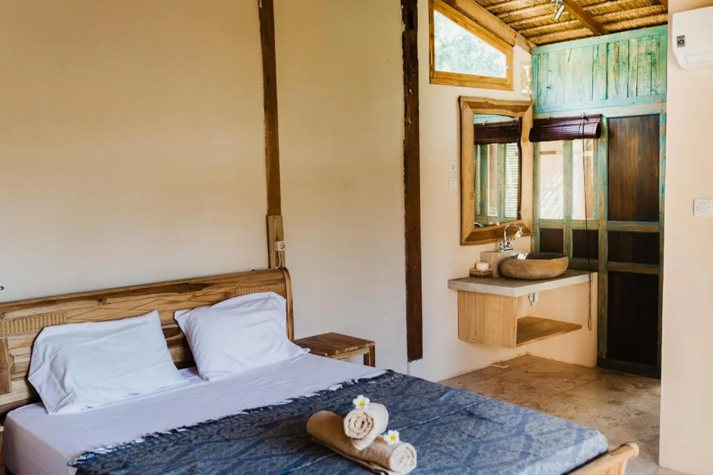 Photo of the whole room, Bed in Kalyssa Beach Bungalows