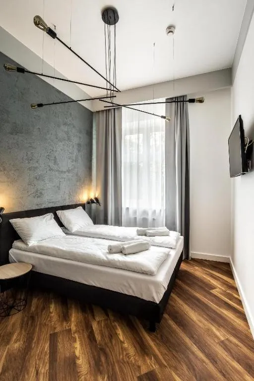 Bed in Apartamenty Nowa Kamienica Częstochowa Centrum Szymanowskiego 22A