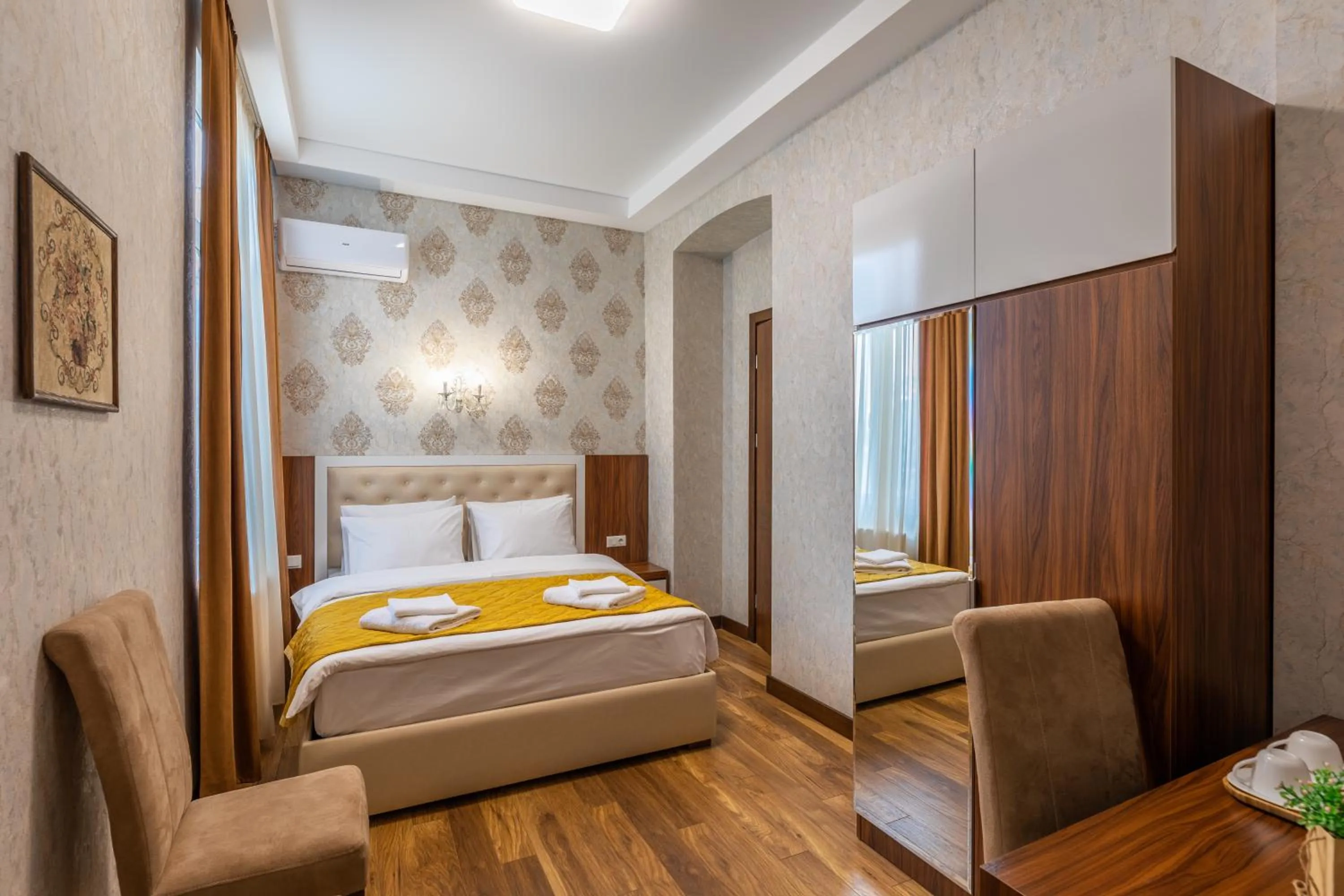 Bed in Ornament Hotel