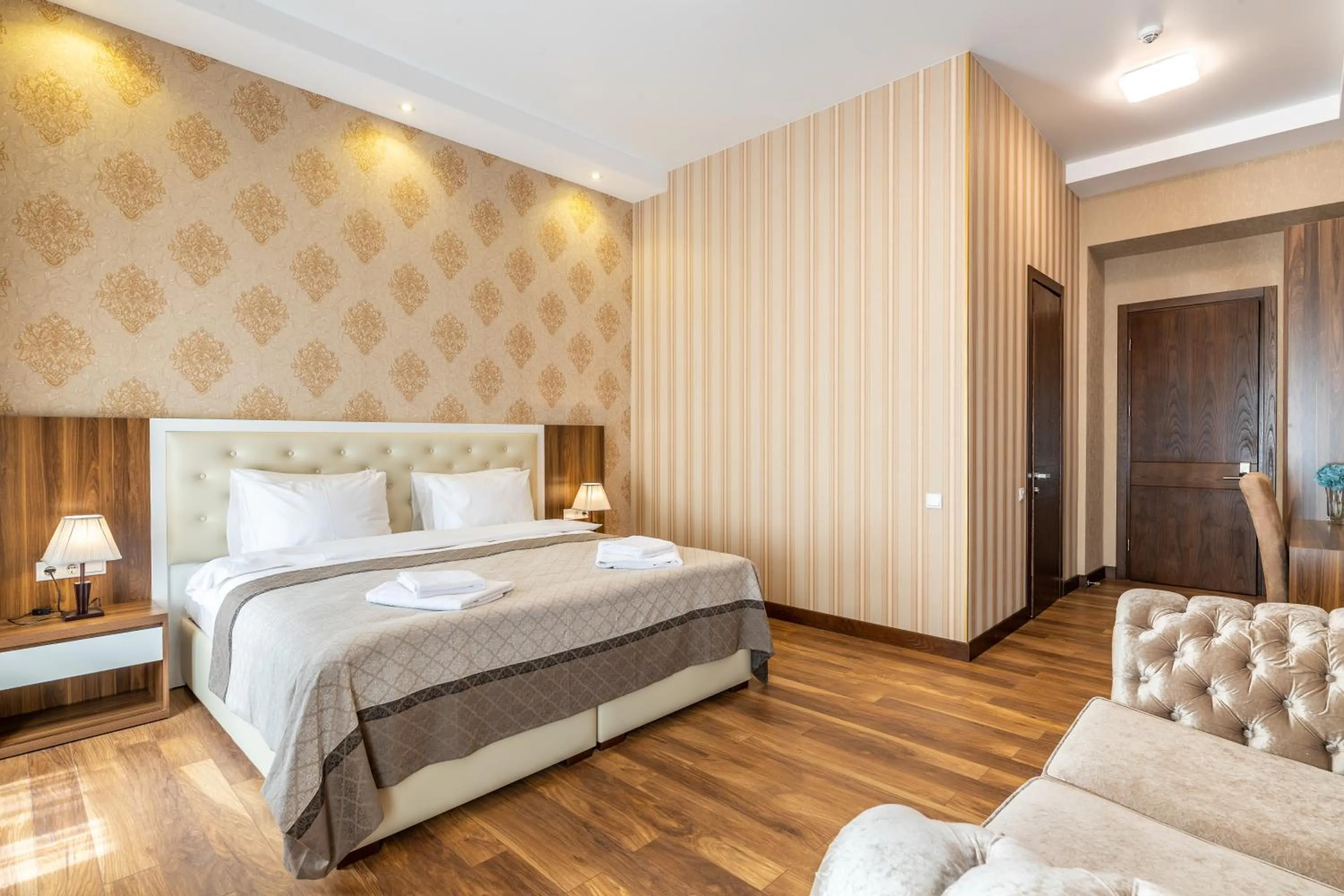 Bed in Ornament Hotel