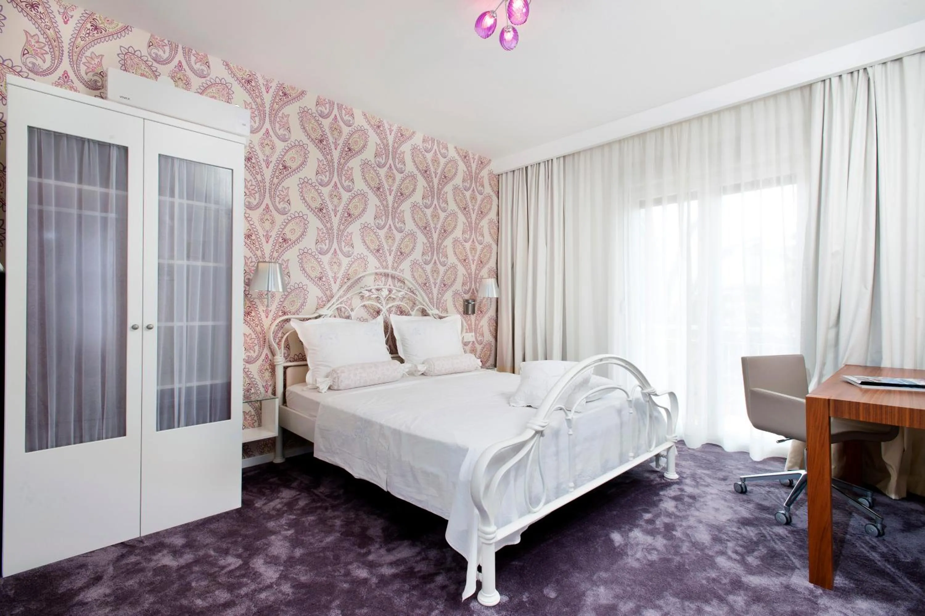 Bed in Boban Luxury Suites