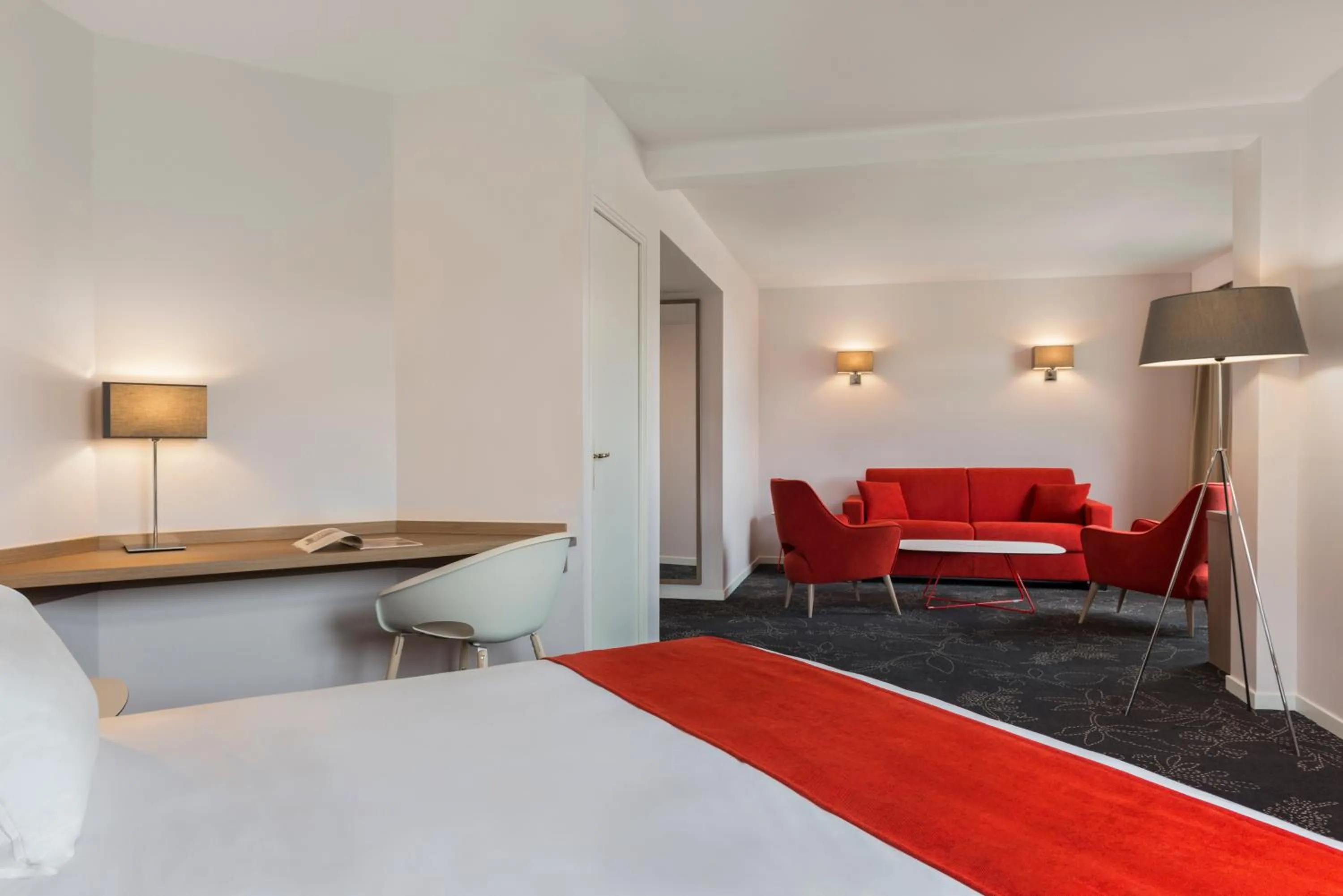 Living room, Bed in Holiday Inn Calais Coquelles by IHG