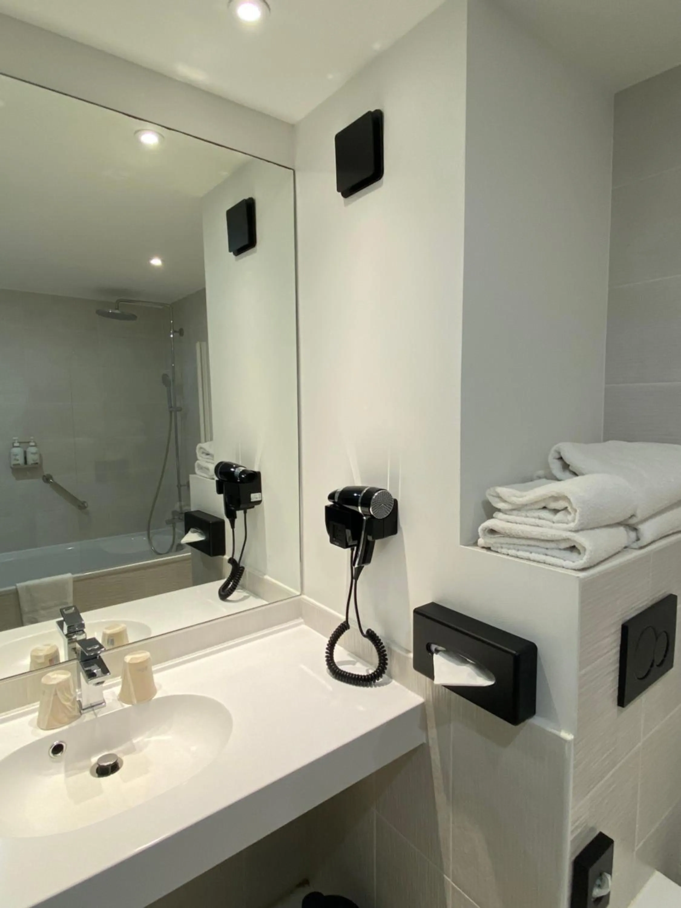 Bathroom in Holiday Inn Calais Coquelles by IHG