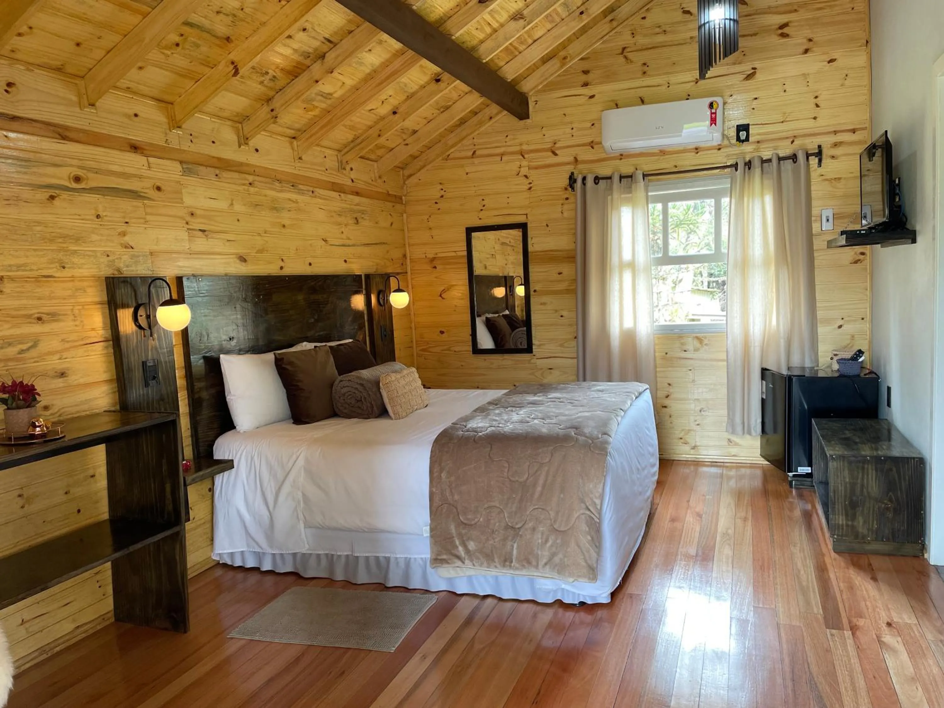 Bed in Pousada Cardoso