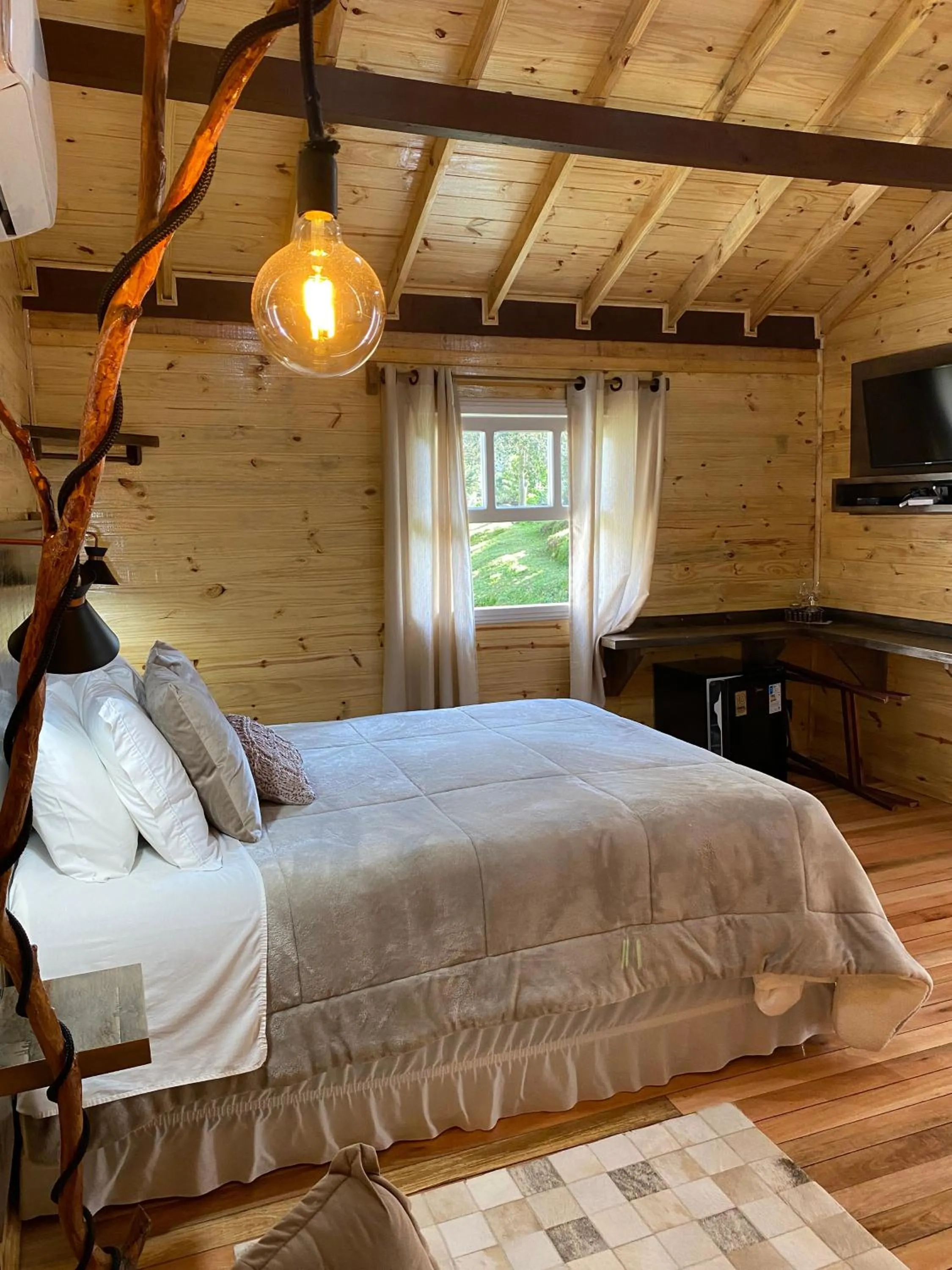 Bed in Pousada Cardoso