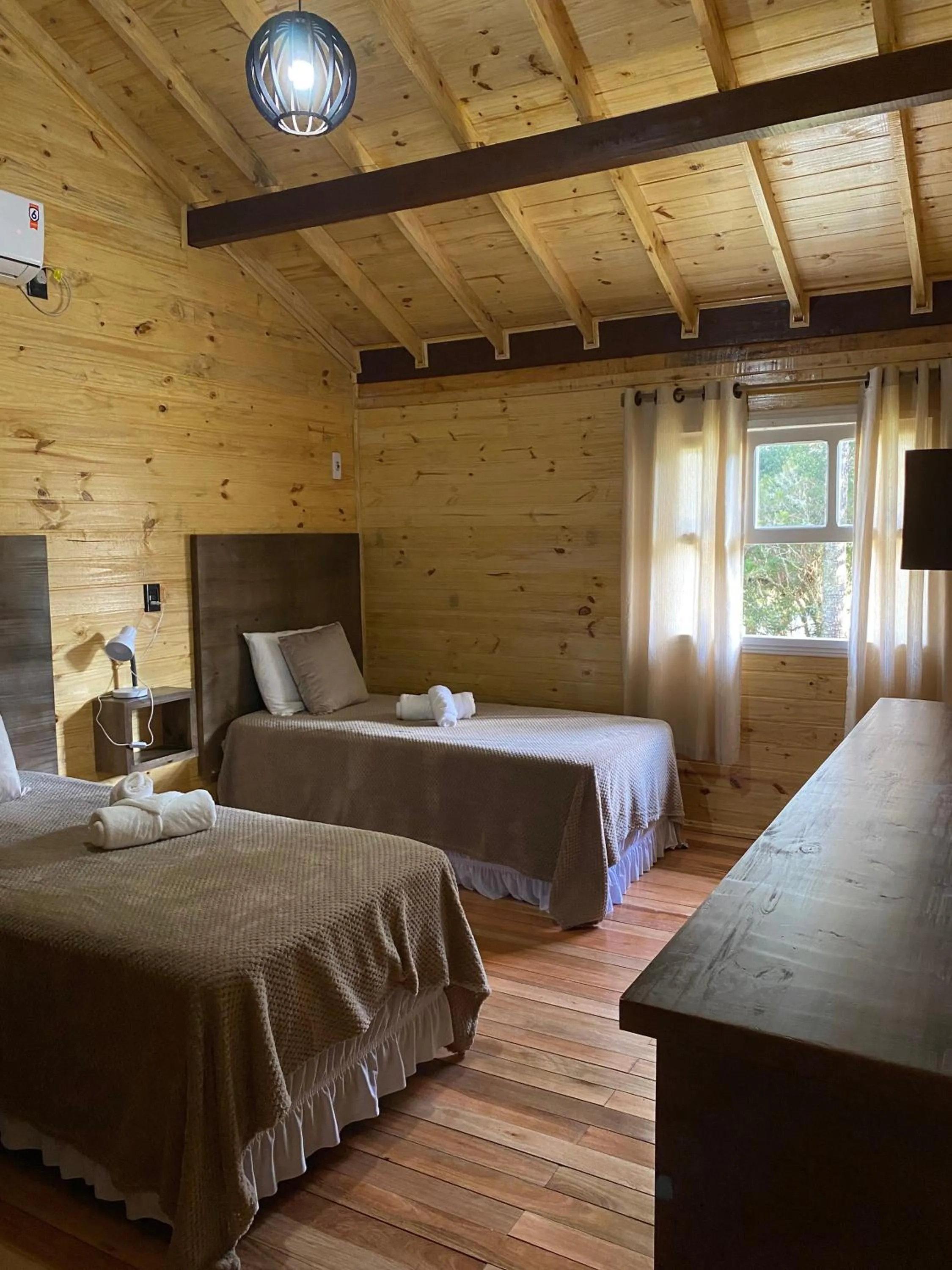 Bed in Pousada Cardoso