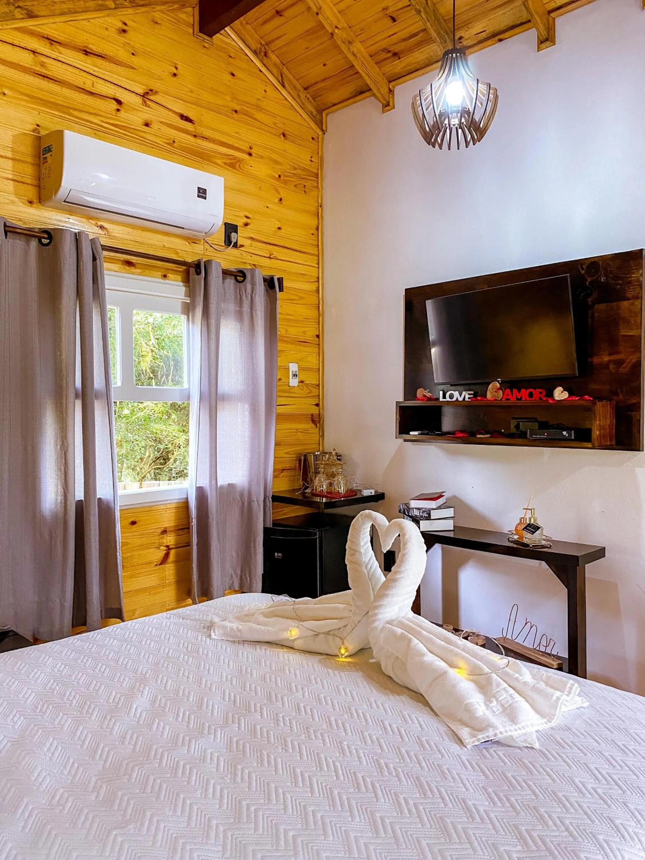 Bed in Pousada Cardoso