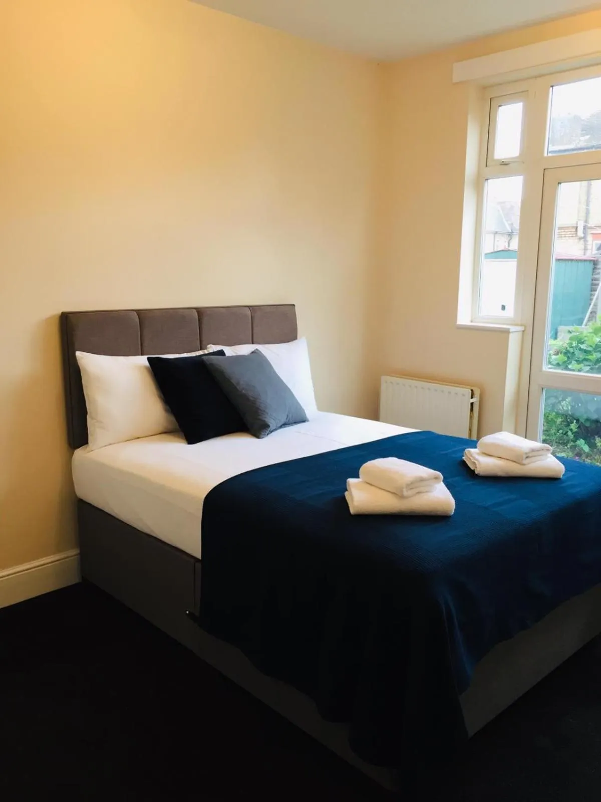 Bedroom, Bed in Marble Apartments Tooting House