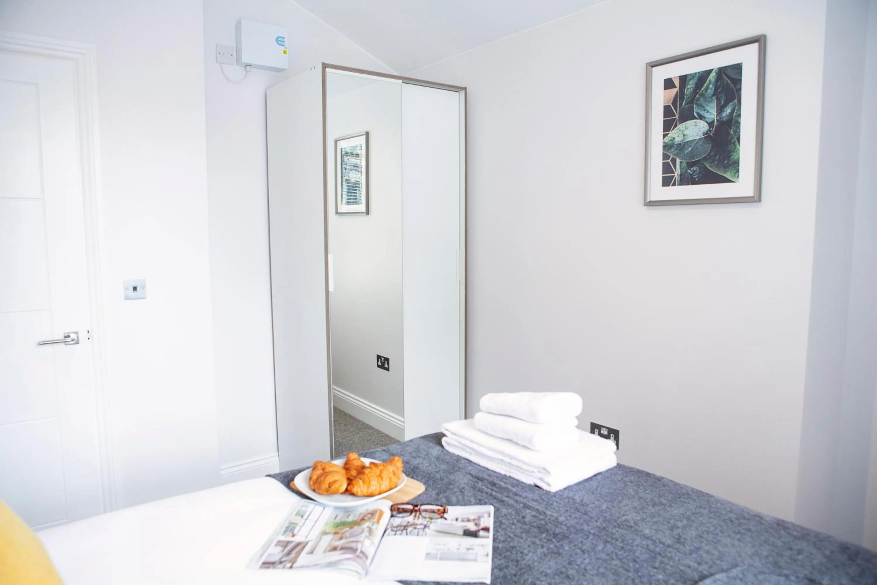 Bed in Quiet Central West End Apartments by Indigo Flats