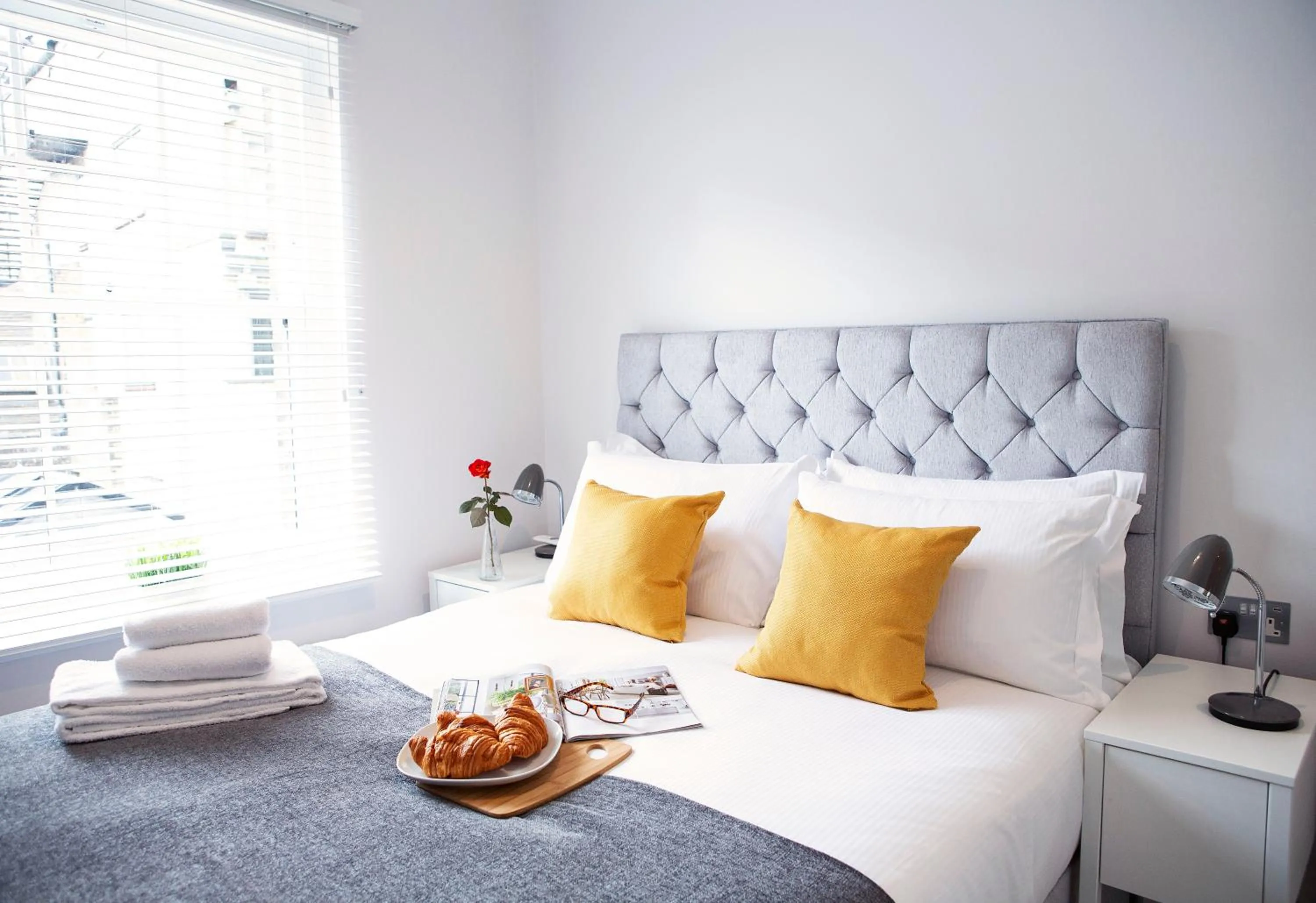 Bed in Quiet Central West End Apartments by Indigo Flats