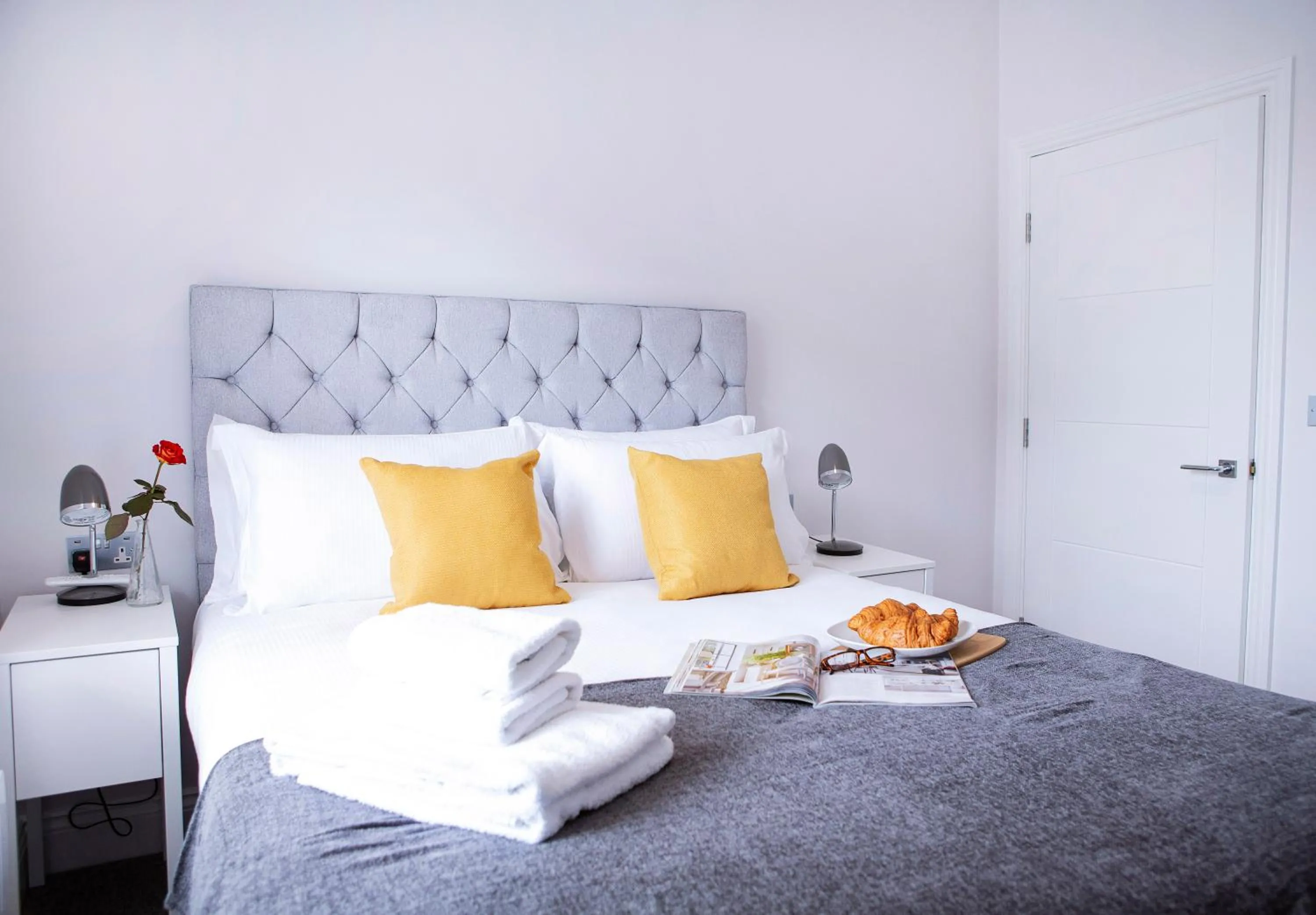 Bed in Quiet Central West End Apartments by Indigo Flats