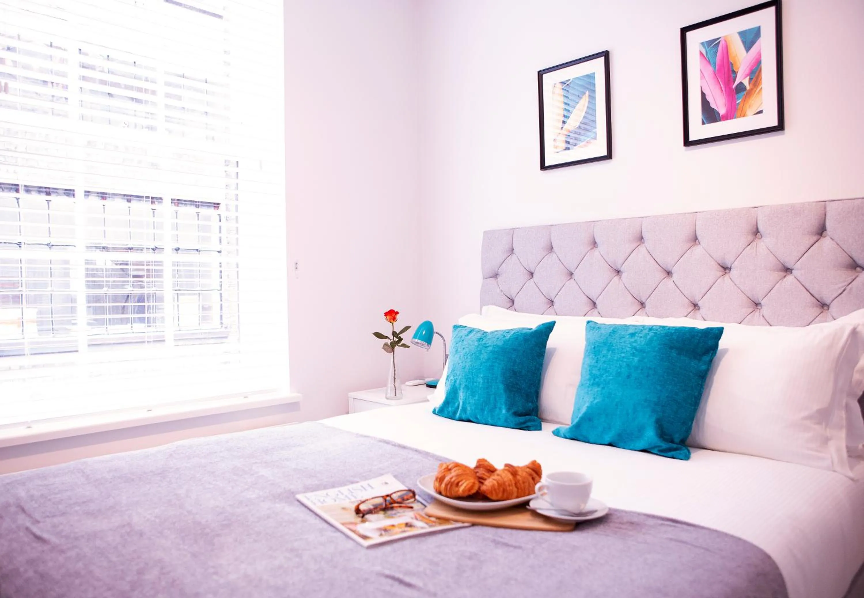 Bed in Quiet Central West End Apartments by Indigo Flats