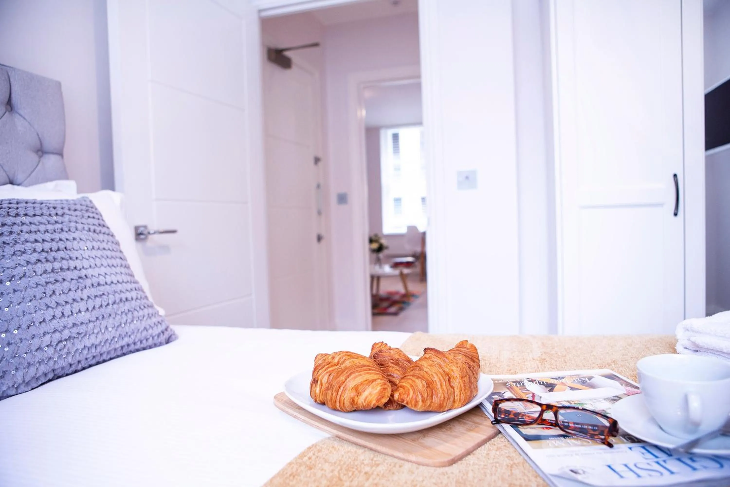 Bed in Quiet Central West End Apartments by Indigo Flats