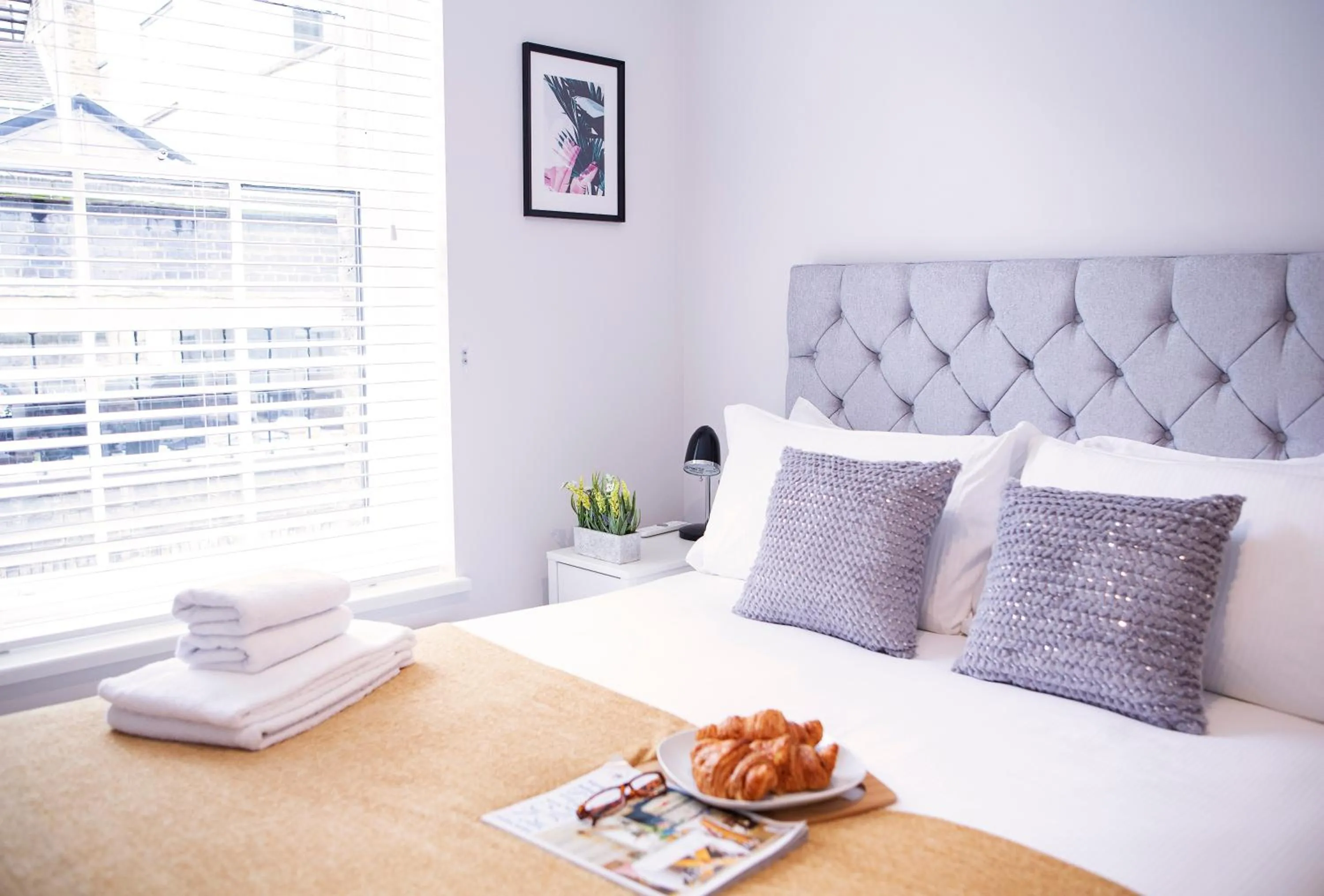 Bed in Quiet Central West End Apartments by Indigo Flats