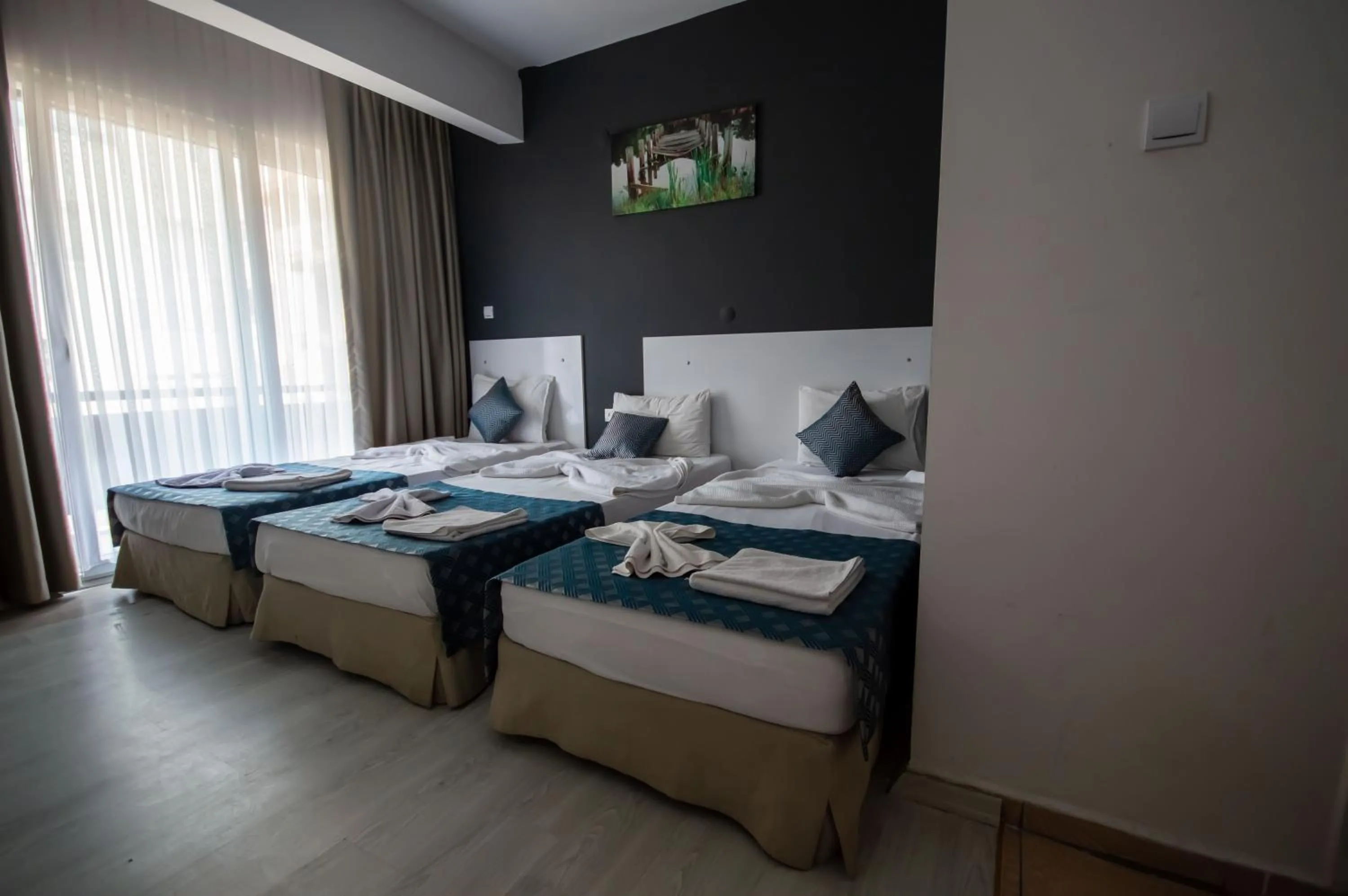 Photo of the whole room, Bed in MOONBOW BEACH HOTEL