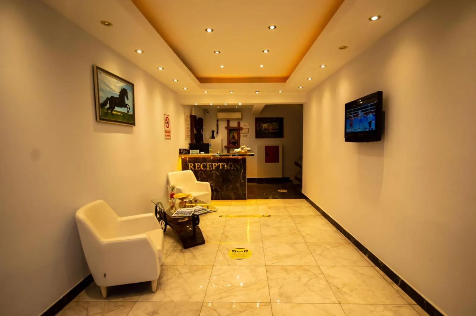 Lobby or reception in MOONBOW BEACH HOTEL